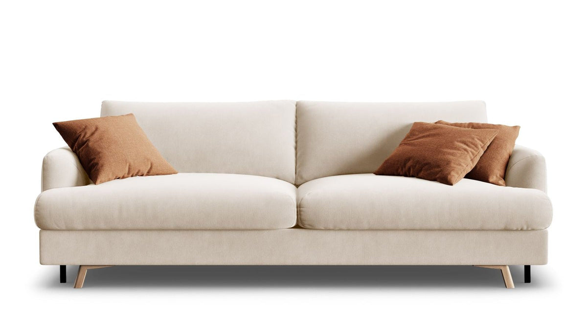 Ecksofa Naomi von Micadoni mit passendem Pouf in einem hellen Wohnzimmer