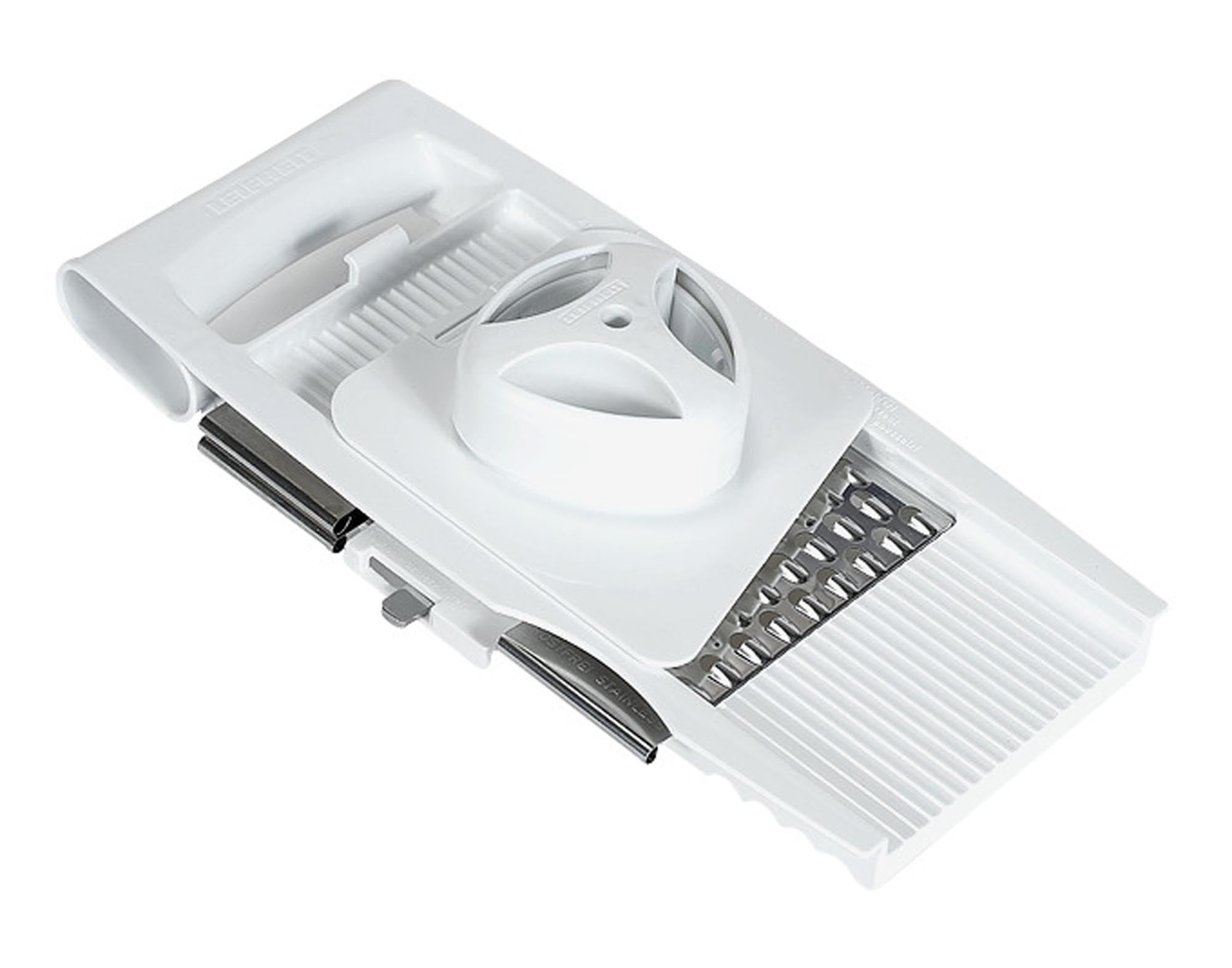 Entdecken Sie die LEIFHEIT Allzweckreibe 4 plus 1 in Weiß – Ihr vielseitiger Küchenhelfer mit 4 Reibeflächen und praktischem Aufbewahrungsbehälter.