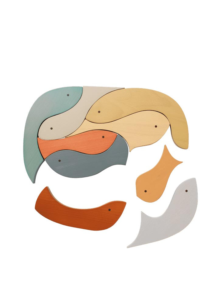 Entdecken Sie das Shoal Puzzle von Ferm Living – ein kreatives, nachhaltiges Holzspielzeug, das Kinder und Erwachsene gleichermaßen inspiriert.