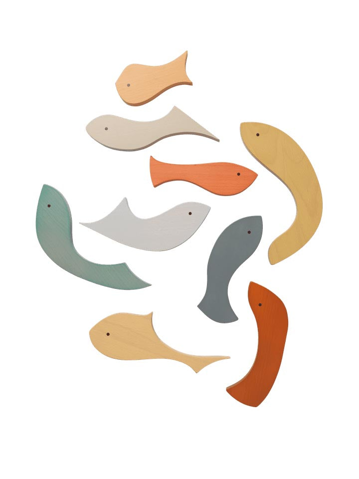 Erleben Sie das Shoal Puzzle von Ferm Living – ein einzigartiges, nachhaltiges Holzspielzeug, das Kreativität und Spielspaß für alle Altersgruppen fördert.
