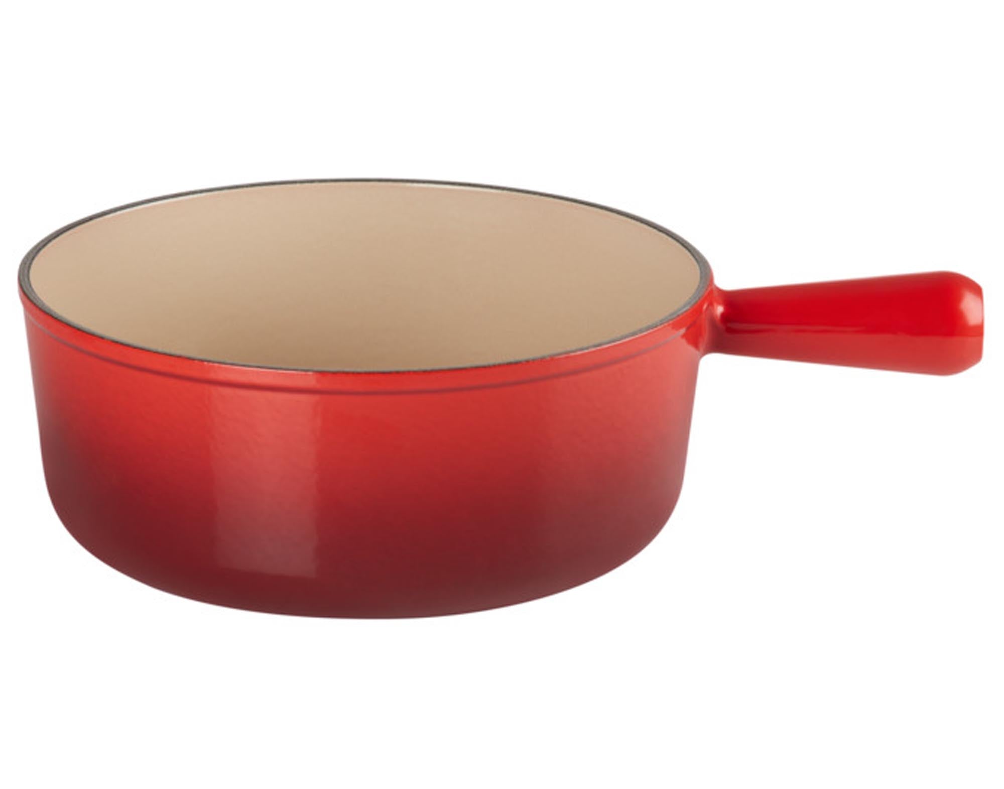 Entdecken Sie das LE CREUSET Fonduecaquelon in kirschrot (ø 22 cm) – ideal für Käse- und Schokoladenfondue, pflegeleicht und für alle Herdarten geeignet.