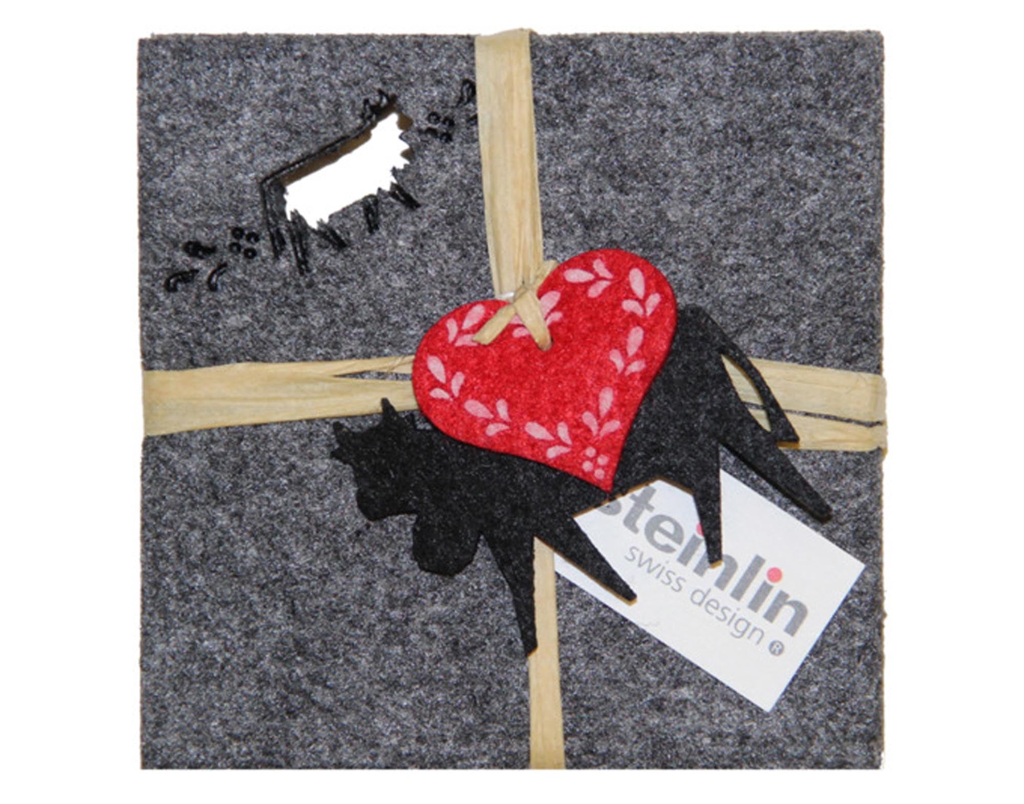 Entdecken Sie die STEINLIN Untersetzer Kuh Filz – praktische, hitzebeständige 10x10 cm Untersetzer im 4er-Set für stilvollen Schutz Ihrer Möbel.