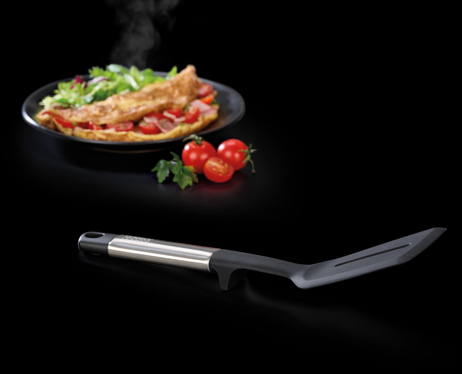 El<tc>eva</tc>te silicone spatula with slotted steel