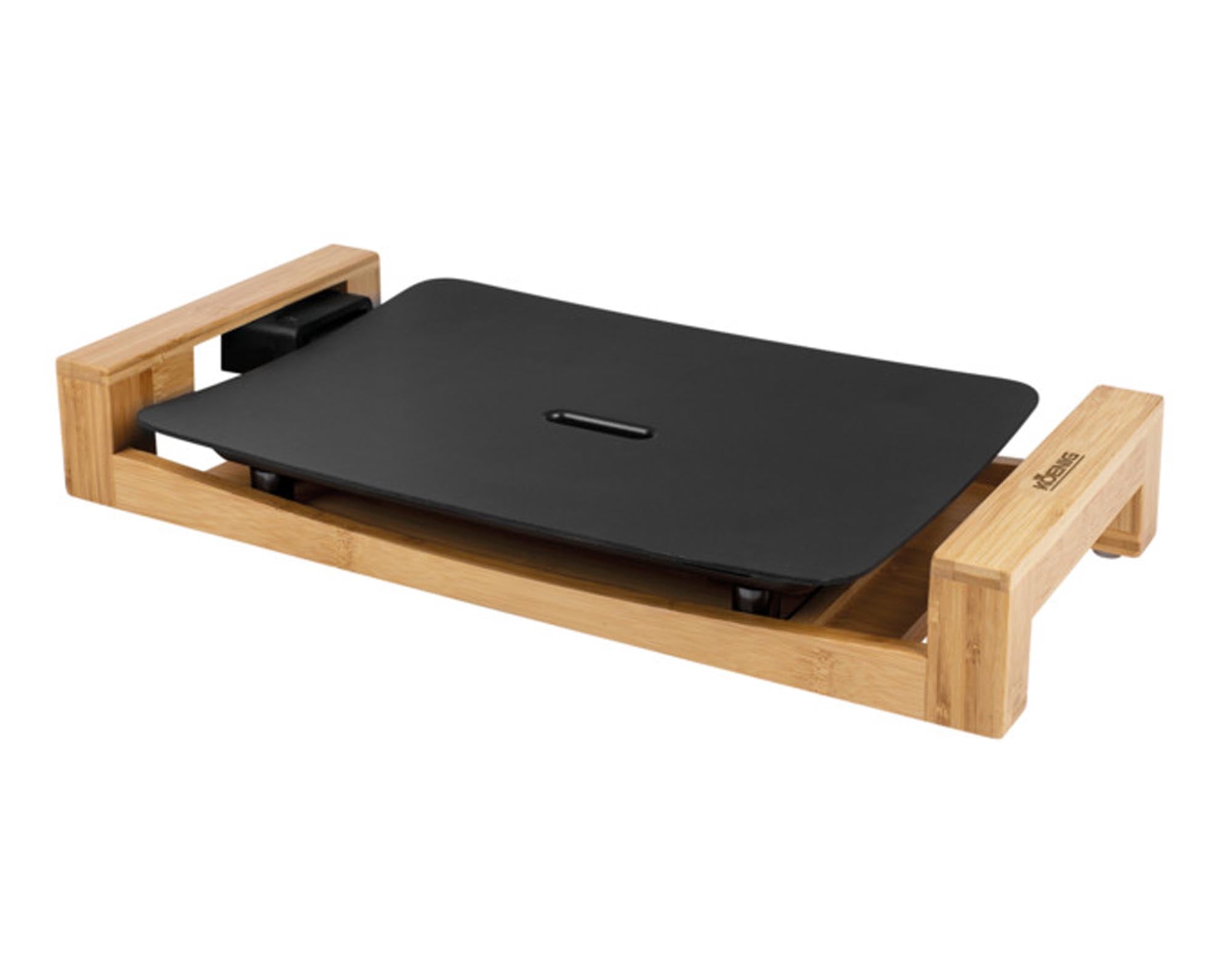 Der stilvolle Tischgrill Bamboo von KOENIG mit Bambusgehäuse ist ideal für drinnen und draussen. Antihaft-Grillplatte, kompakt, leistungsstark.