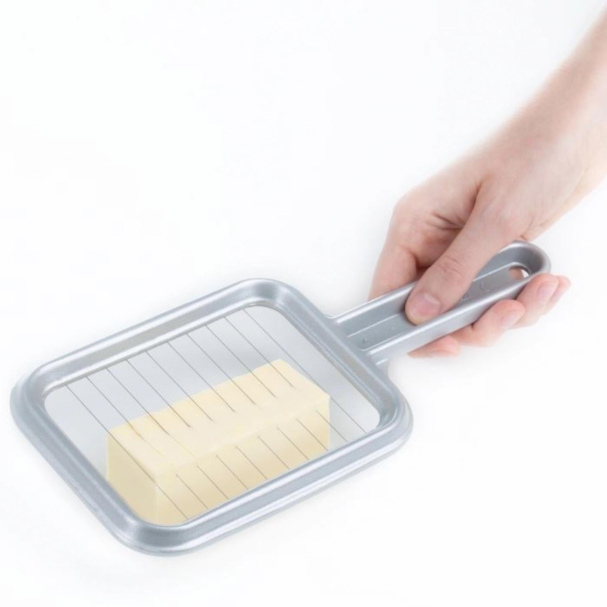 Butterteiler Portionetto von Westmark, perfekt für exaktes Portionieren von Butter, Masse: 25,5x11,5x1,3 cm, langlebig und benutzerfreundlich.