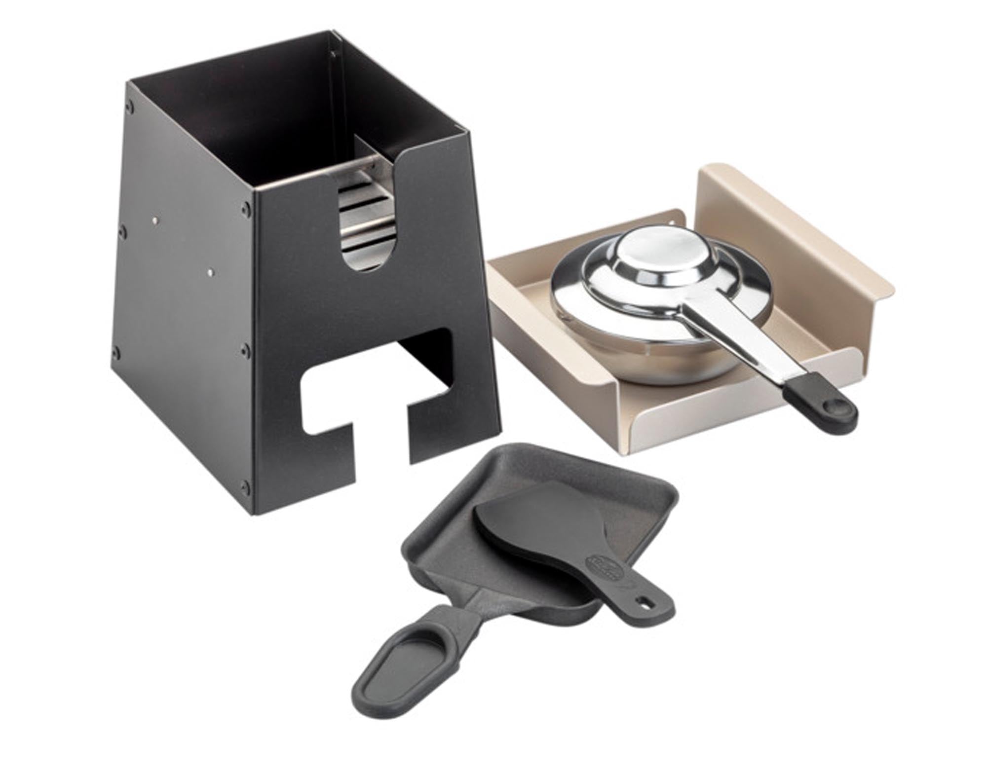 Das Raclettegerät Vulcano von TTM: robust, stromlos, für 8 Personen, mit Gusseisen-Grill und Antihaftbeschichtung, ideal für gesellige Abende.