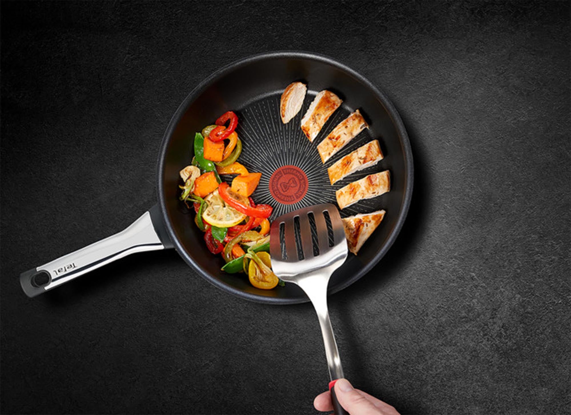 Die TEFAL Bratpfanne Excellence ø 32 cm bietet perfekte Hitzeverteilung, Antihaft-Beschichtung und Thermo-Spot für ideale Bratergebnisse.