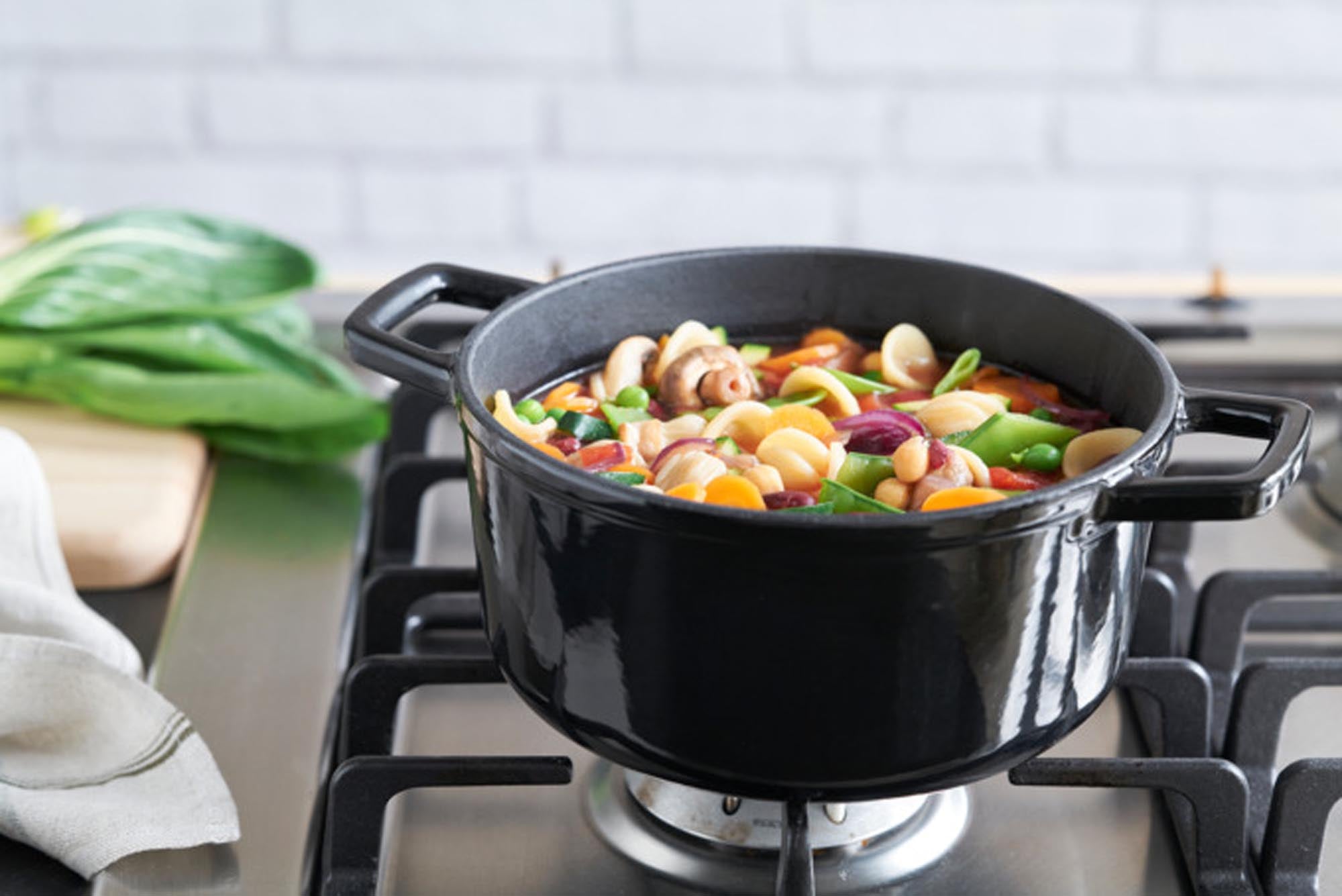 KISAG Fonduetopf Duo ø 20 cm: Perfekt für gesellige Abende, zwei Töpfe für Käse, Fleisch oder Schokolade, antihaftbeschichtet, stilvoll.