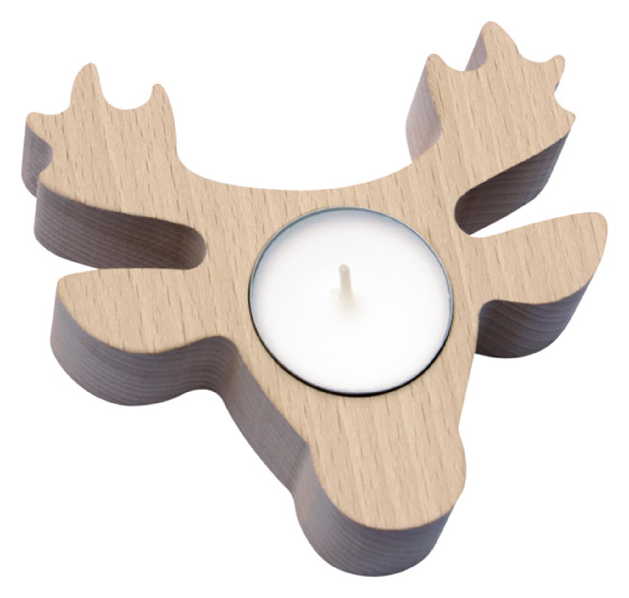 Eleganter Teelichthalter aus Buche mit filigraner Steinbock-Kontur. Handgefertigt in der Schweiz, bringt Wärme und Anmut in Ihr Zuhause.