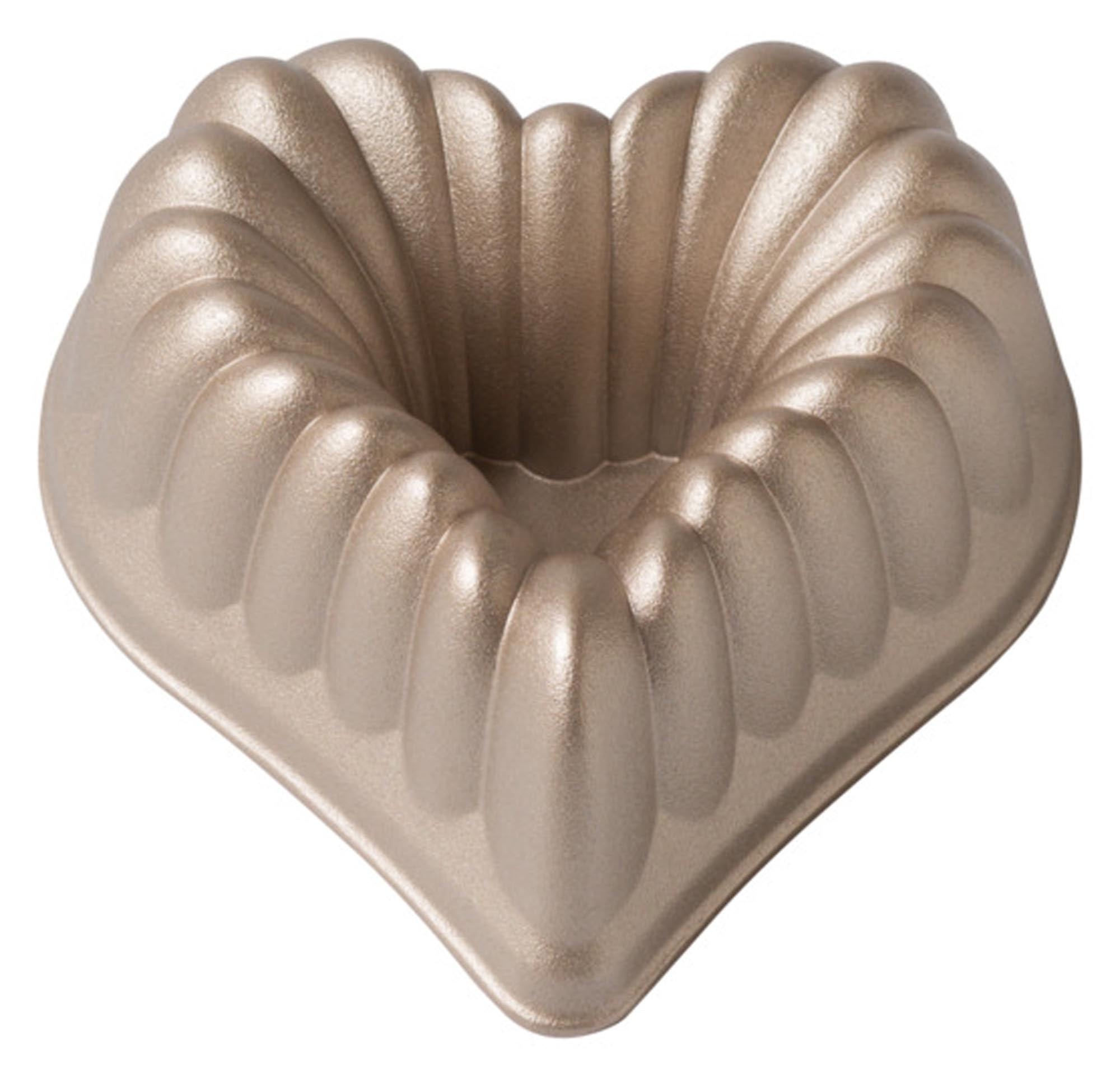 Entdecken Sie die DECORA Backform Antihaft Herz Beatrice (16x16x6 cm) für romantische Kuchen, Torten und Desserts. Ideal für besondere Anlässe!