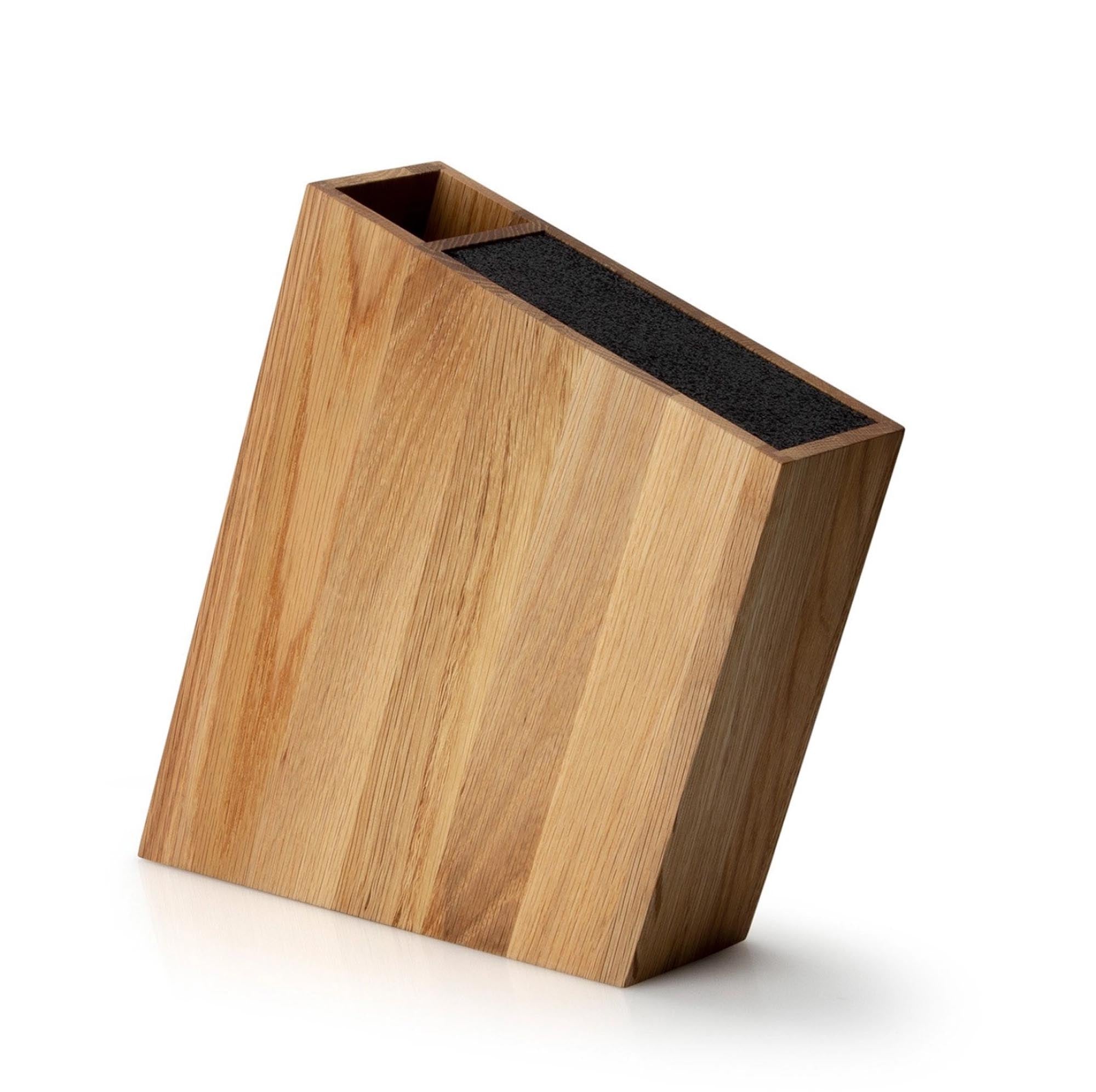 Entdecken Sie den robusten Eiche Messerblock von Continenta mit flexiblem Einsatz und schrägem Utensilienbehälter – ideal für Ihre Küchenorganisation!