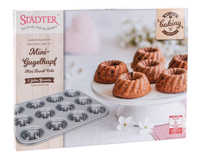 Entdecken Sie das STÄDTER Backblech Gugelhupf Mini 35x27 cm für 12 perfekte Mini-Gugelhupfe. Ideal für Backliebhaber, mit Antihaftbeschichtung für müheloses Backen!