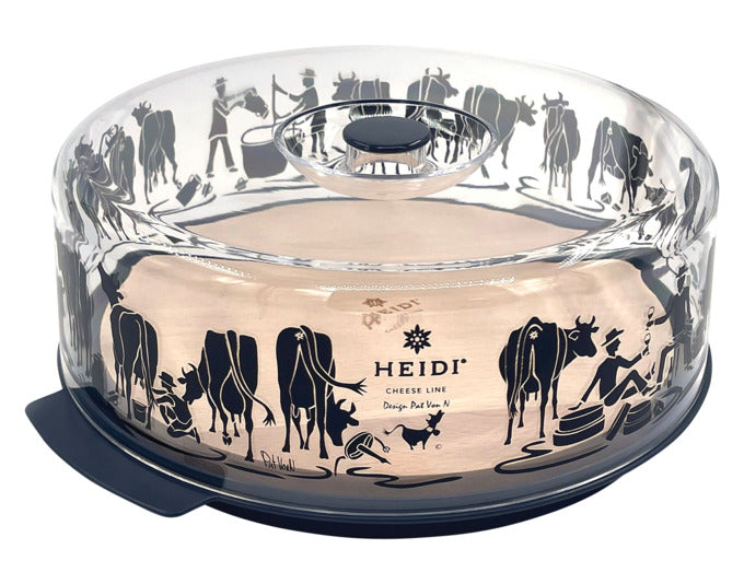 HEIDI Käsebox Kühe auf der Weide ø 26x10 cm mit Buchenholzteller schwarz transparent in präsentiert im Onlineshop von KAQTU Design AG. Käsezubehör ist von HEIDI