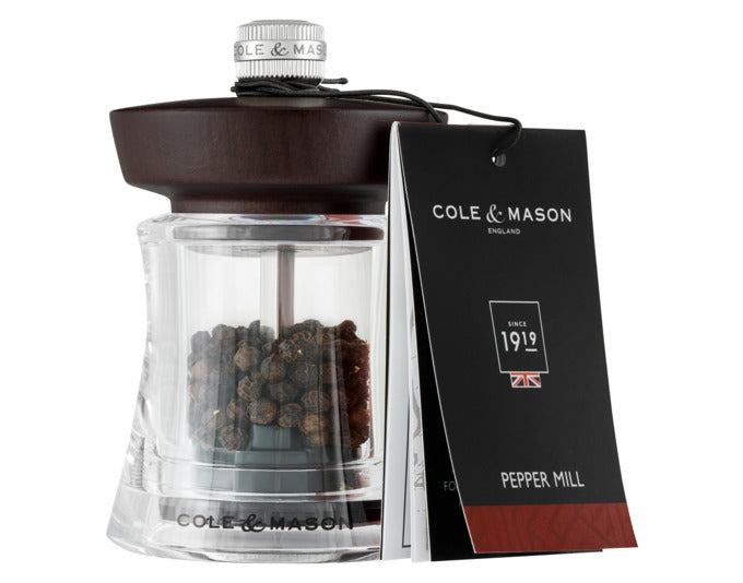Entdecken Sie die COLE&MASON Pfeffermühle Holborn aus edlem Acryl und dunklem Buchenholz. Kompakt, stilvoll und mit präzisem Mahlwerk für intensives Aroma.