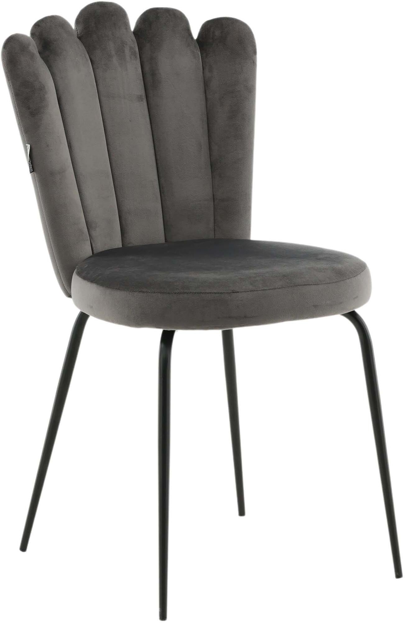 Entdecken Sie den Limhamn Stuhl: Eleganter Samt und robustes Metall vereinen sich für höchsten Komfort und Stil in Ihrem Esszimmer.