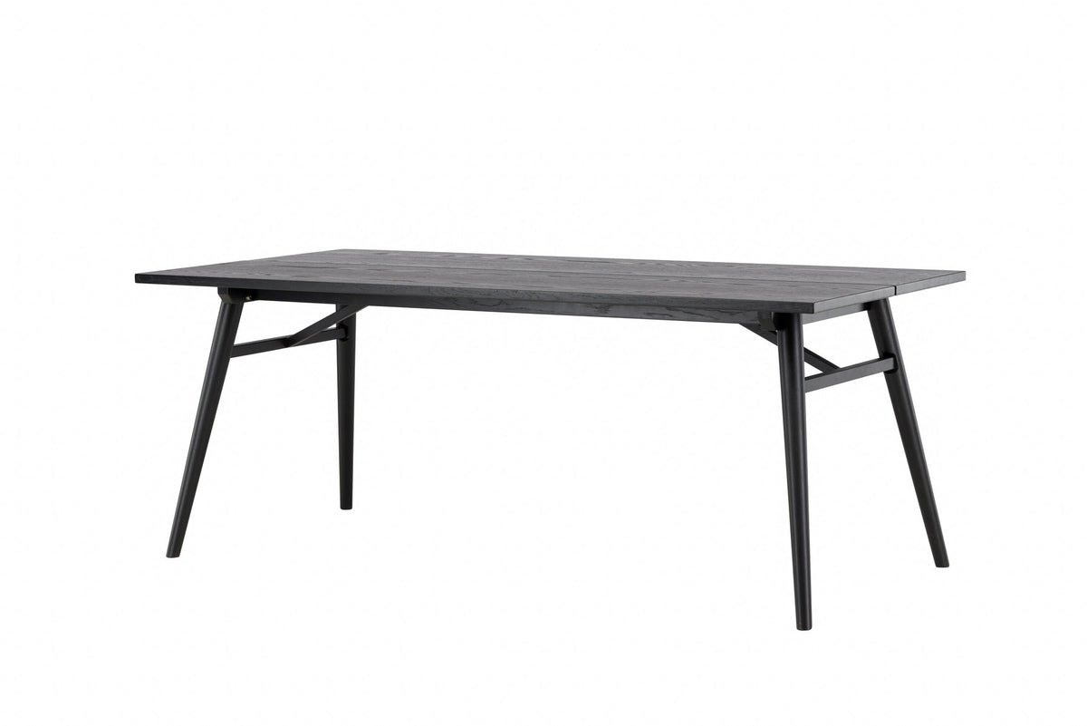 Sleek ausziehbarer Tisch in Schwarz präsentiert im Onlineshop von KAQTU Design AG. Esstisch ist von Venture Home