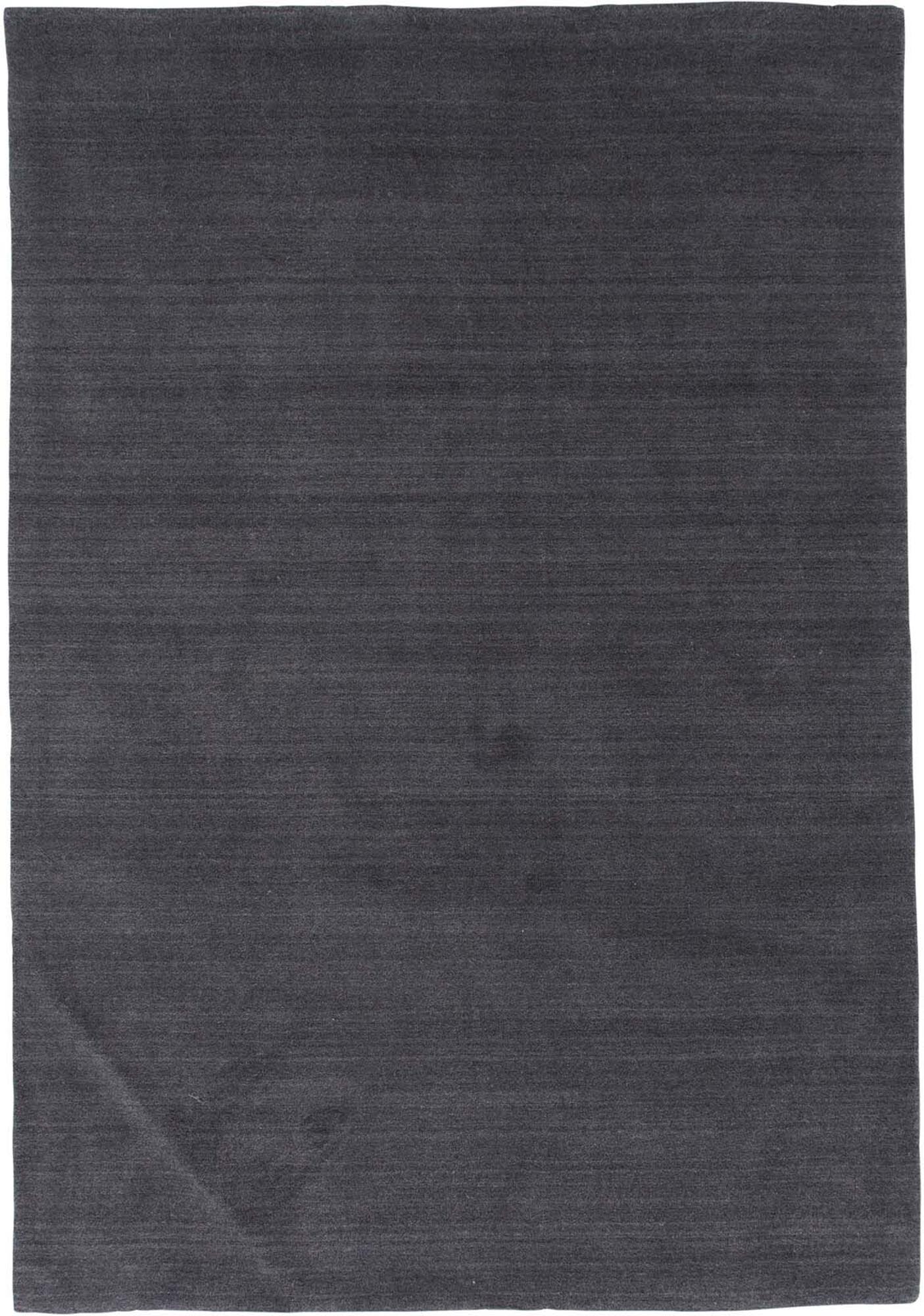 Ulla Teppich von Venture Home: Eleganter Wollteppich in Dunkelgrau, perfekt für stilvolle Räume und angenehme Akustik.