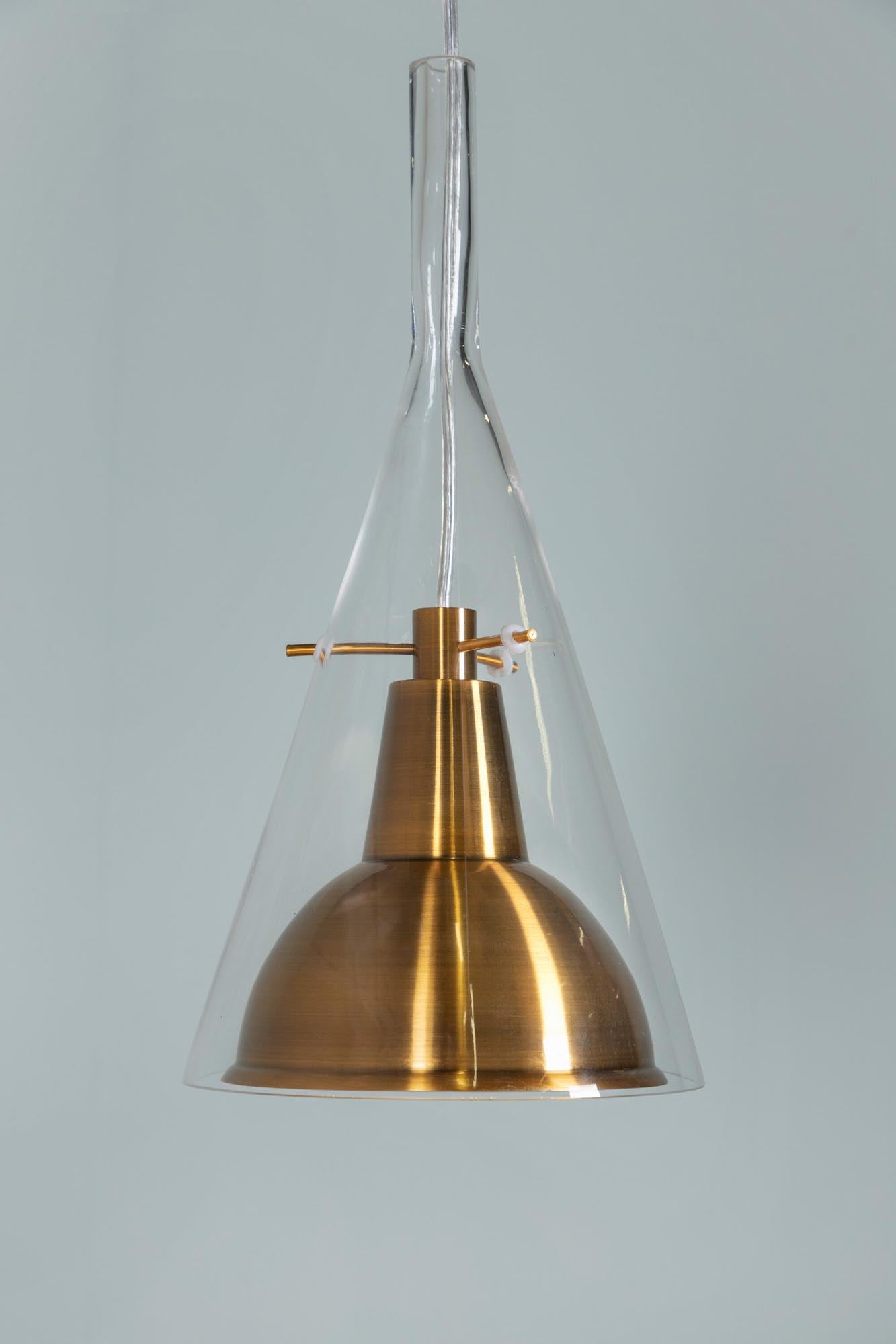 Sirius Pendelleuchte in Gold präsentiert im Onlineshop von KAQTU Design AG. Pendelleuchte ist von Venture Home