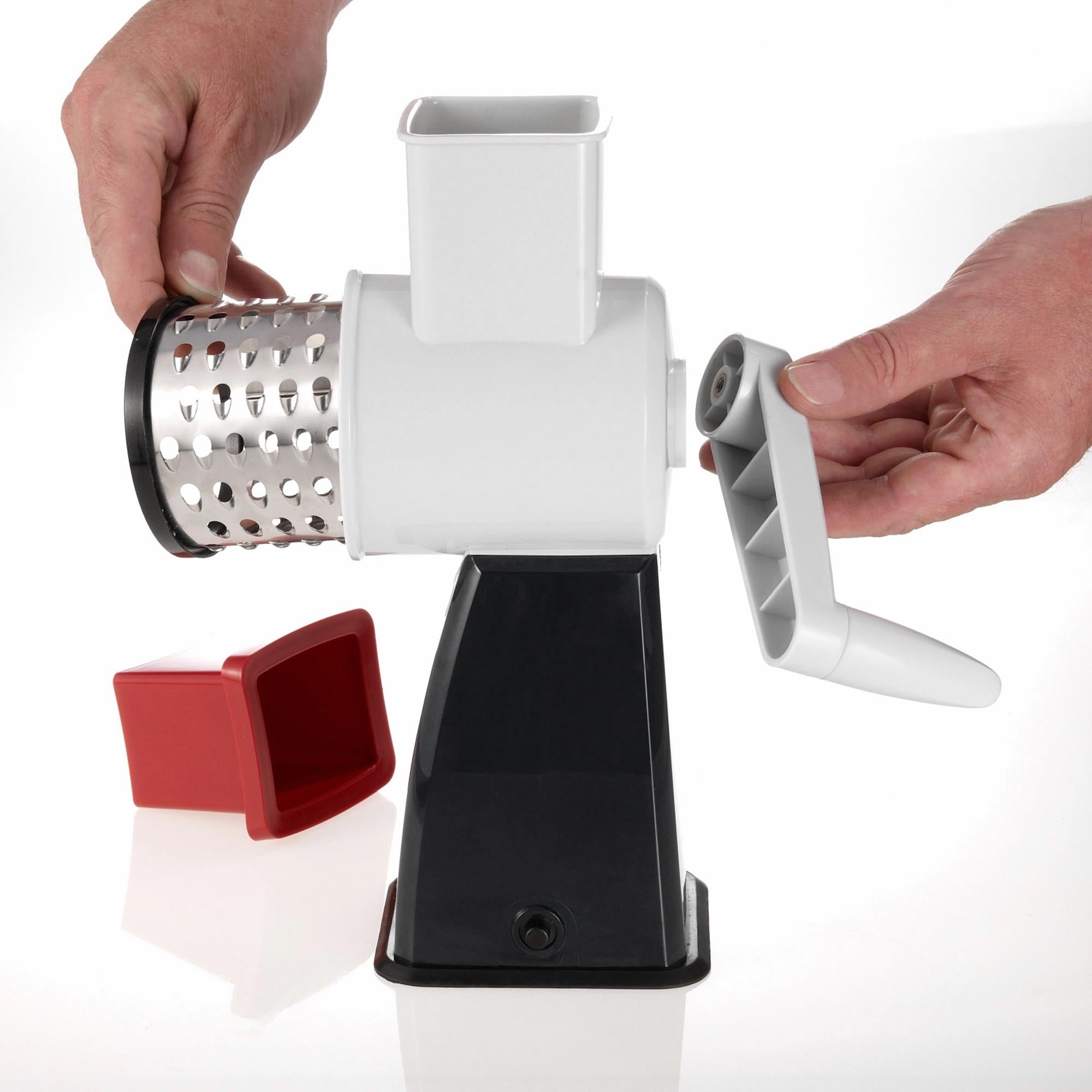 Westmark Reibmaschine mit 4 Trommeln, perfekt für Käse und Gemüse. Kompakte Grösse: 20x11x27,5 cm. Vielseitig und benutzerfreundlich.