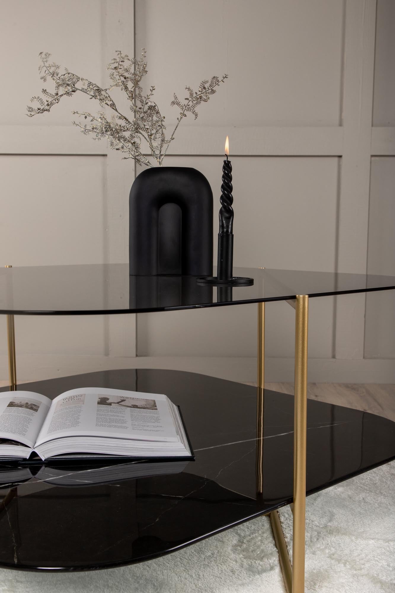 Entdecken Sie den Un-line Beistelltisch von Venture Home: Ein stilvolles Möbelstück aus edlem Marmorglas und robustem Metallgestell für Ihr Zuhause.