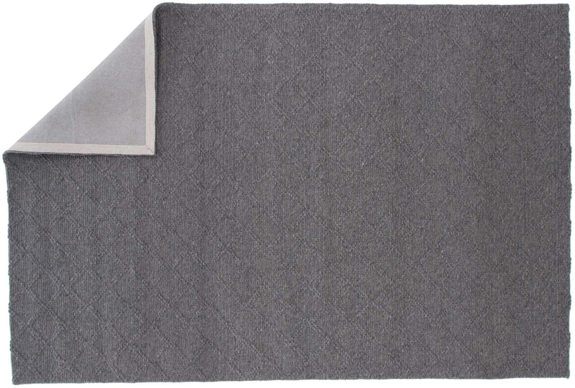 Erleben Sie den Cloudy Teppich von Venture Home – ein eleganter Wollteppich, der mit seinem sanften Farbwechselmuster und der hochwertigen Verarbeitung jeden Raum aufwertet.