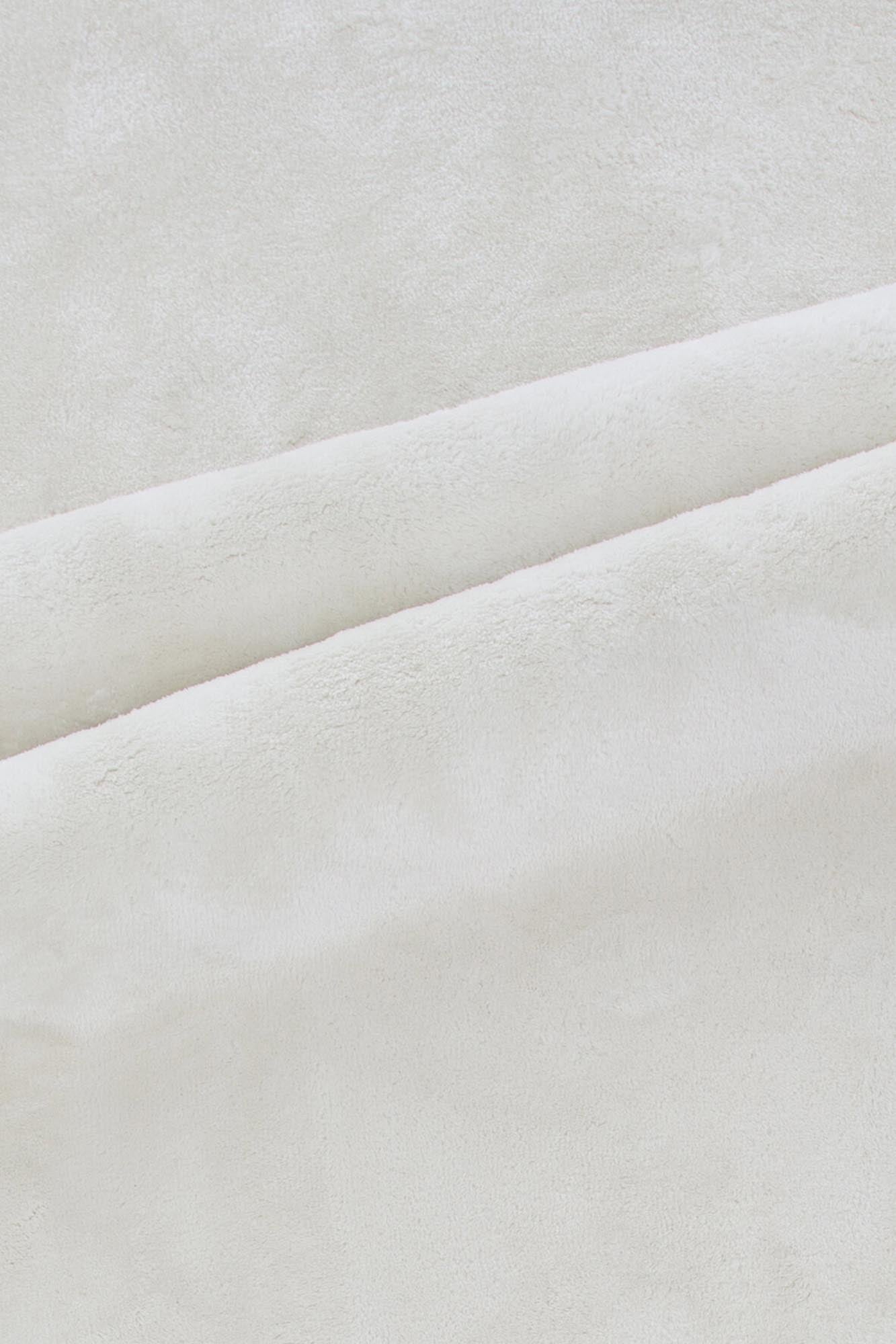 Blanca Teppich von Venture Home: Eleganter, runder Teppich aus langlebigem Polyester in warmen Beigetönen für einladende Wohnräume.