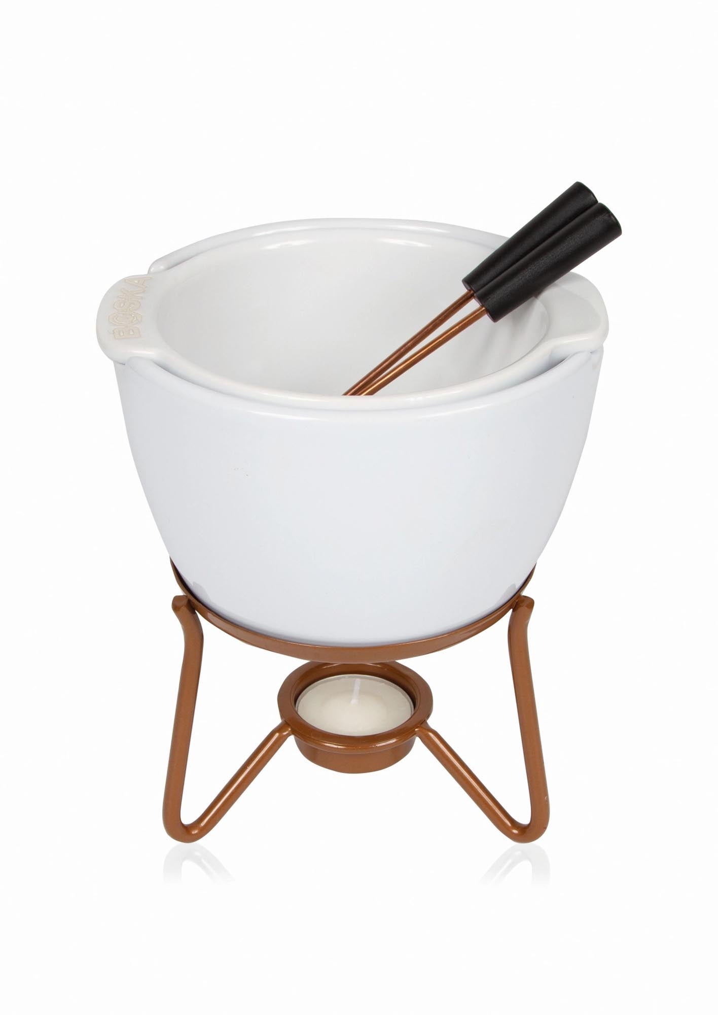 Erleben Sie süsses Fondue mit dem Choco Fondue Marie von Boska. Keramik & Edelstahl, 4 Personen, optimale 40°C, mikrowellen- & spülmaschinengeeignet.