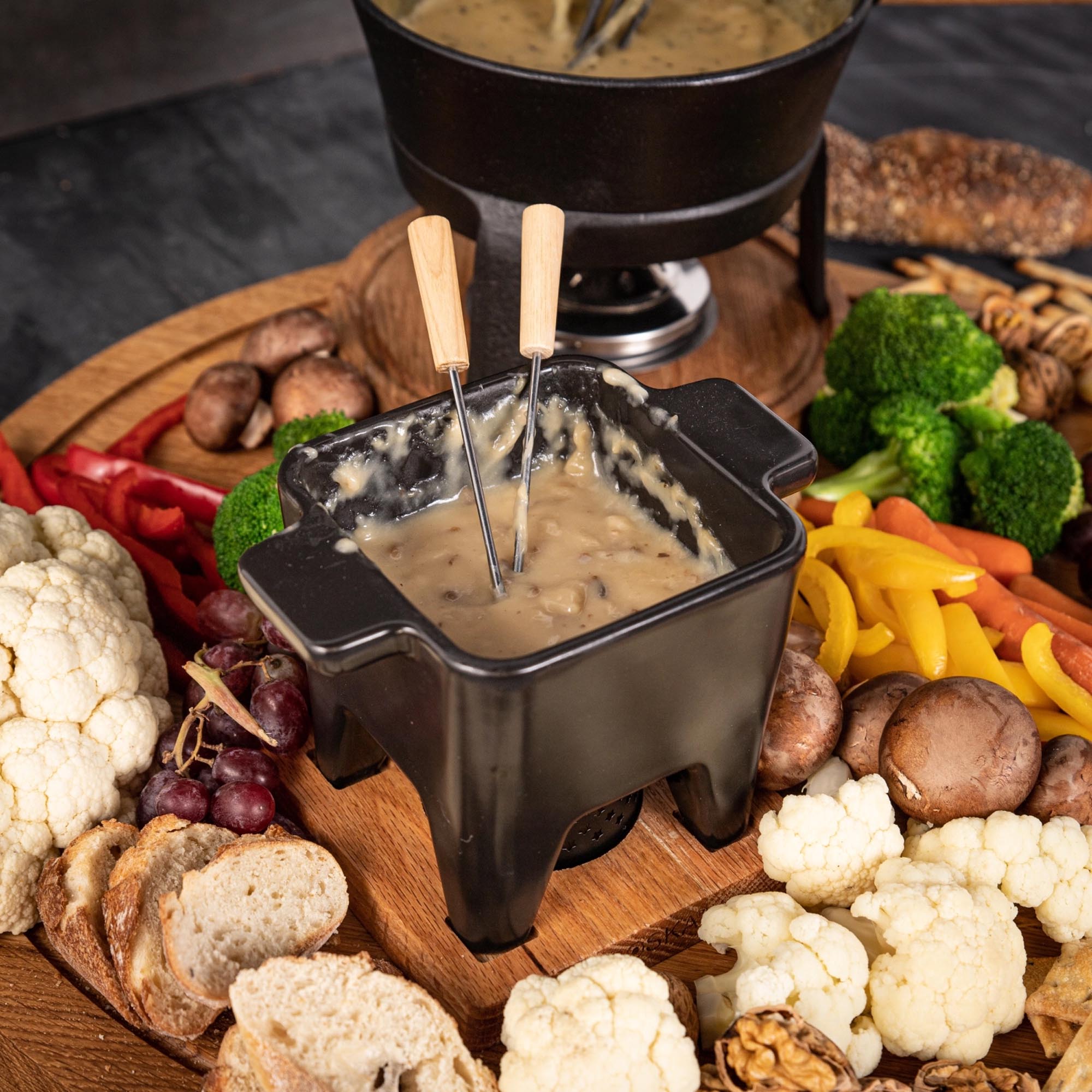 Erleben Sie mit dem Fondue Nero L 400ml von Boska ein stilvolles Tapas-Fest. Ideal für köstliche Saucen und gesellige Runden.
