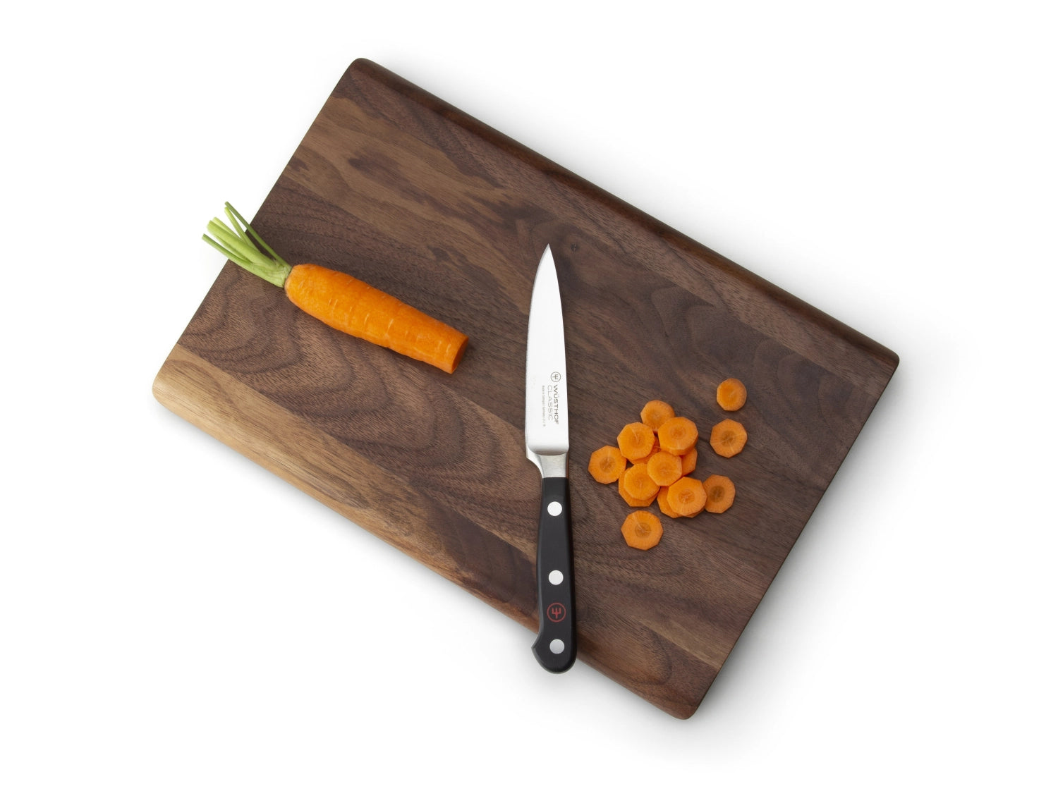 Erleben Sie das exquisite Walnuss Schneidebrett von Continenta (30x20x1.5 cm) – ein elegantes Küchenaccessoire für vielseitige Anwendungen.