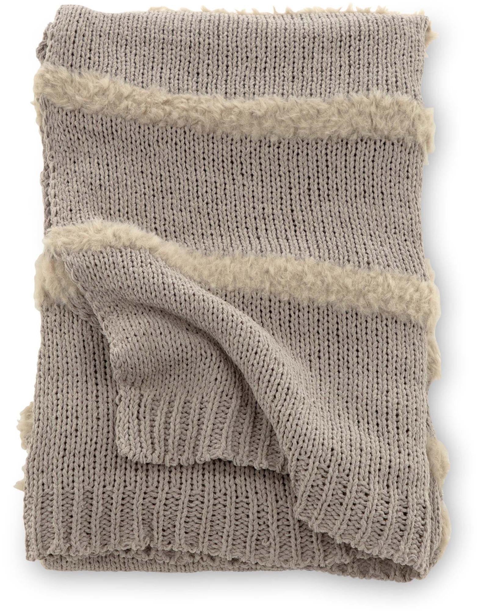 Kathleen Throw: Elegante Gemütlichkeit für moderne Wohnräume.