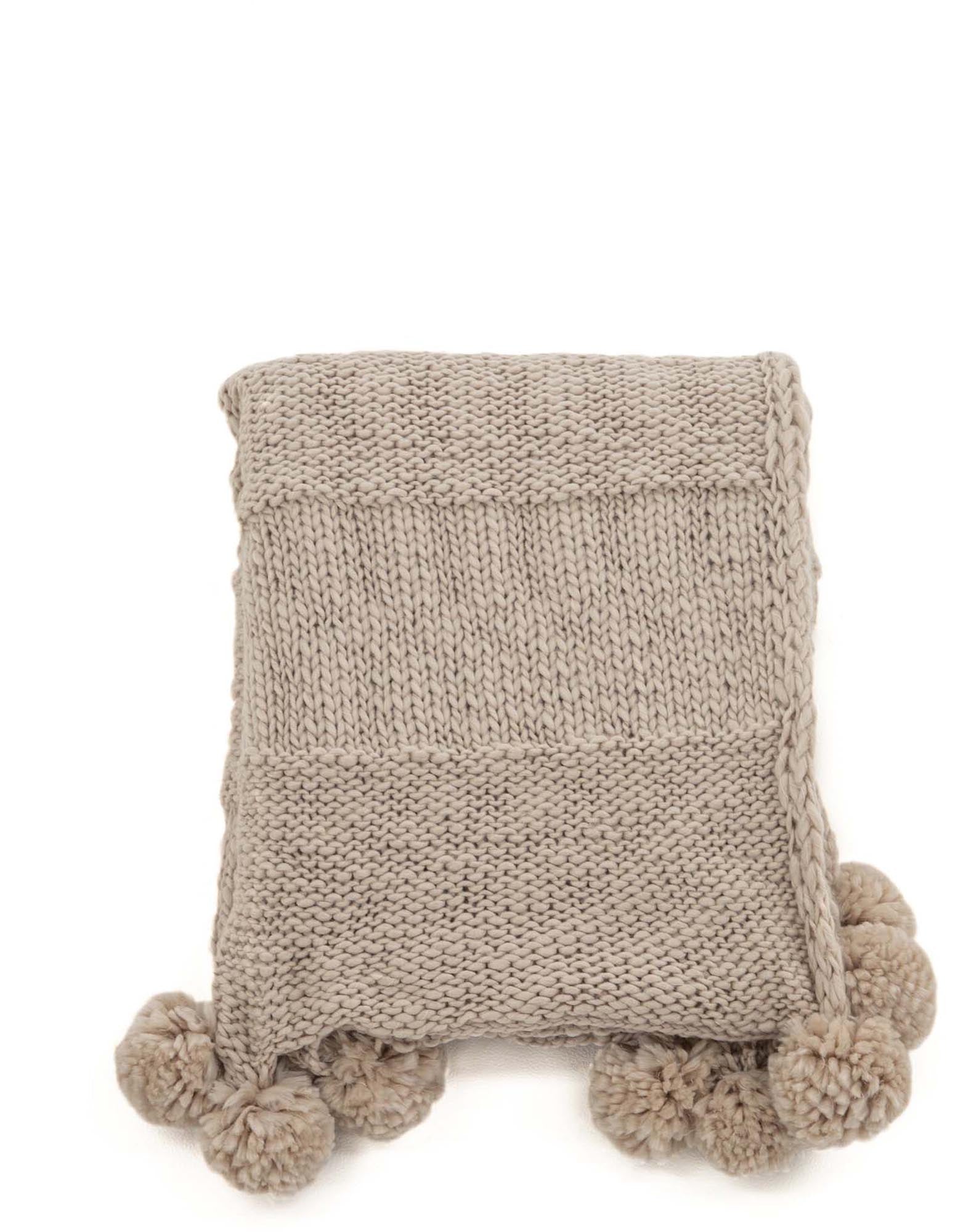 Die Anny Throw von Venture Home: Eine elegante, vielseitige Wolldecke in Beige, ideal zum Kuscheln und Dekorieren in jedem Zuhause.