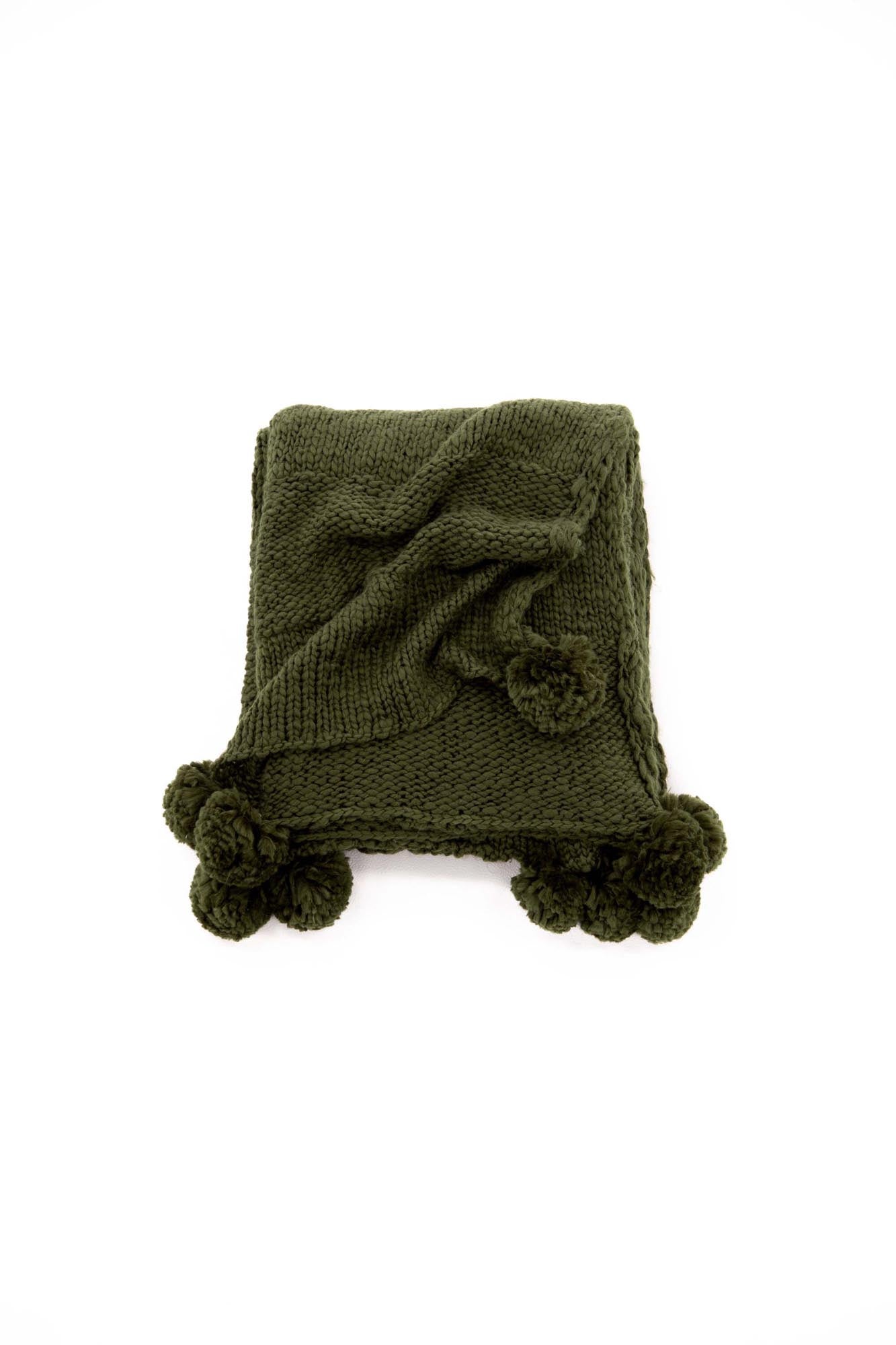 Die Anny Throw von Venture Home ist eine stilvolle, beige Wolldecke mit Quasten, ideal für Komfort und Eleganz in jedem Raum.