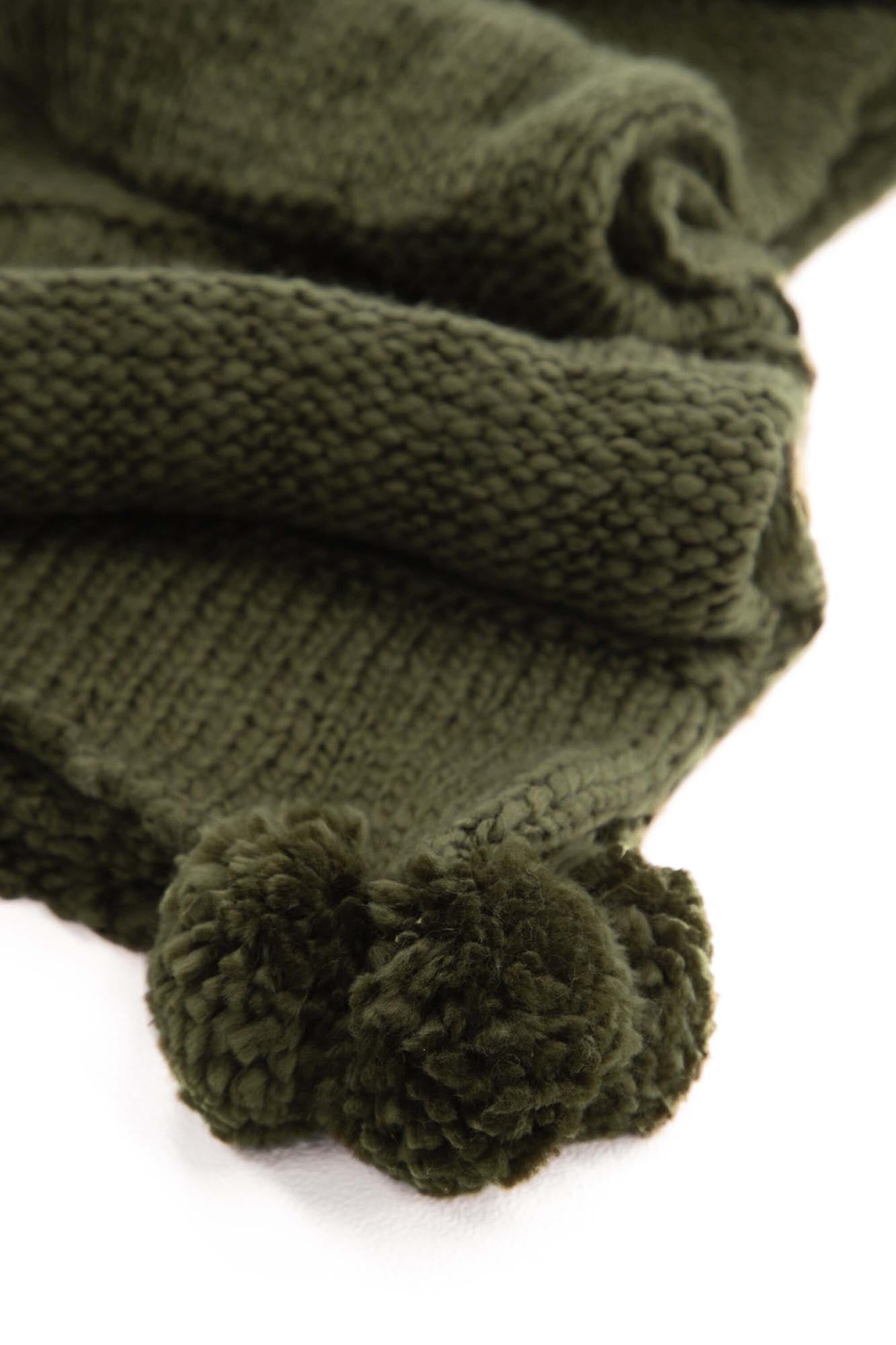 Elegante Anny Throw Decke in Beige für moderne Wohnräume.