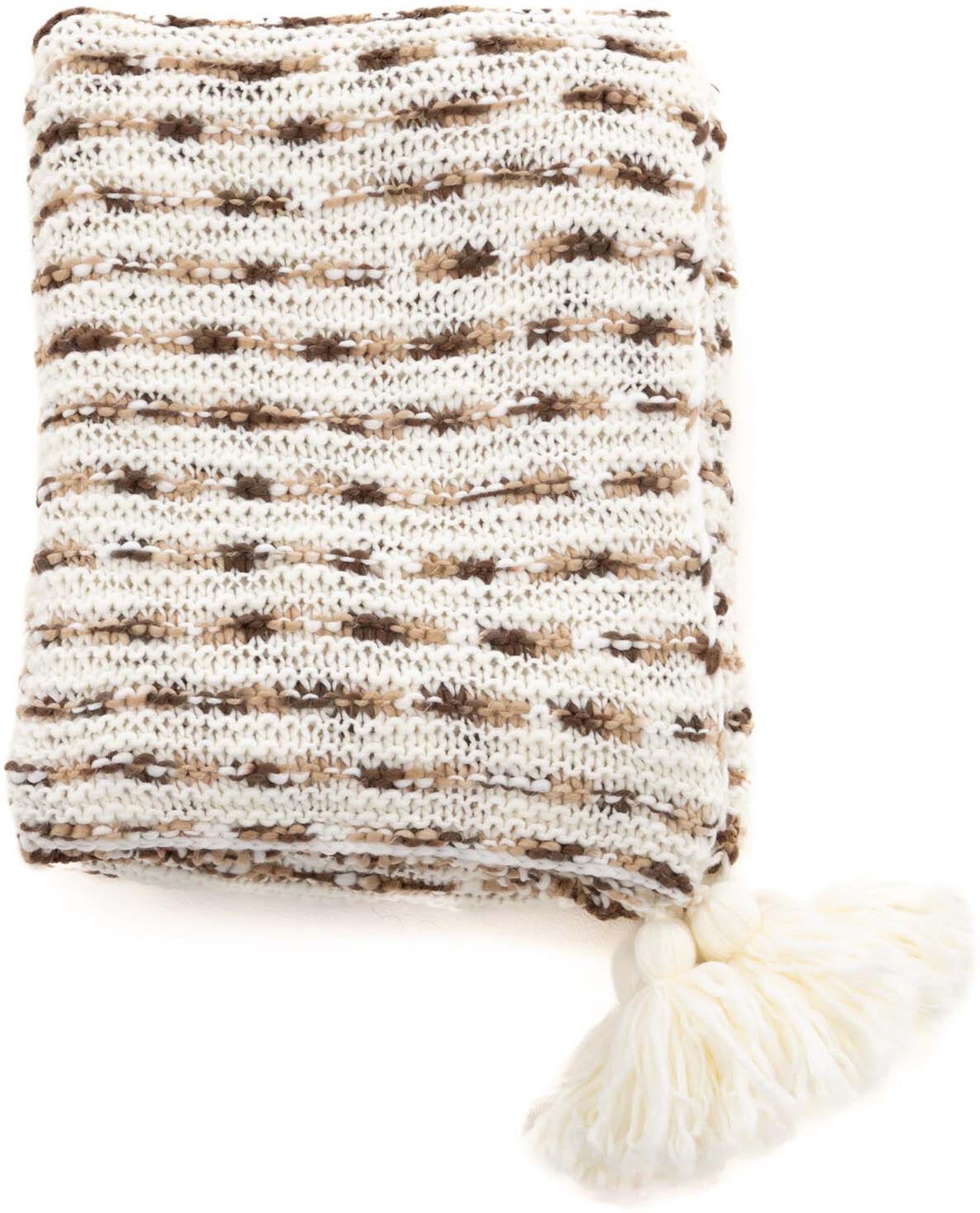 Die Unny Throw von Venture Home: stilvolle, pflegeleichte Acryl-Wolldecke für Wärme, Komfort und vielseitige Wohnakzente.