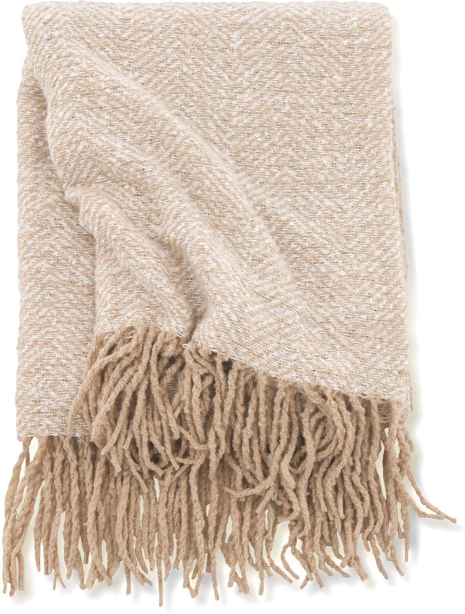 Entdecken Sie die Toby Throw von Venture Home – eine elegante Wolldecke, die Gemütlichkeit und Stil in Ihr Zuhause bringt.