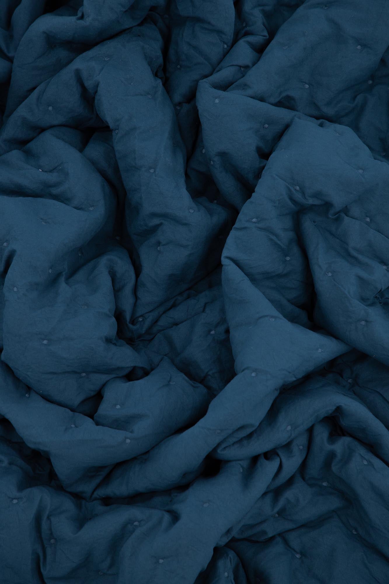 Sally Tagesdecke: Luxuriöse Wärme und modernes Design vereint.