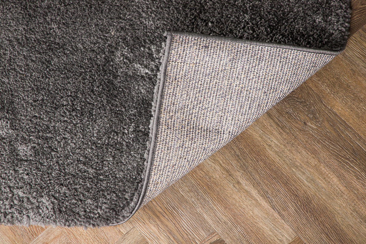 Walter Pluto Teppich Rechteckig in Dunkelgrau präsentiert im Onlineshop von KAQTU Design AG. Teppich ist von Venture Home