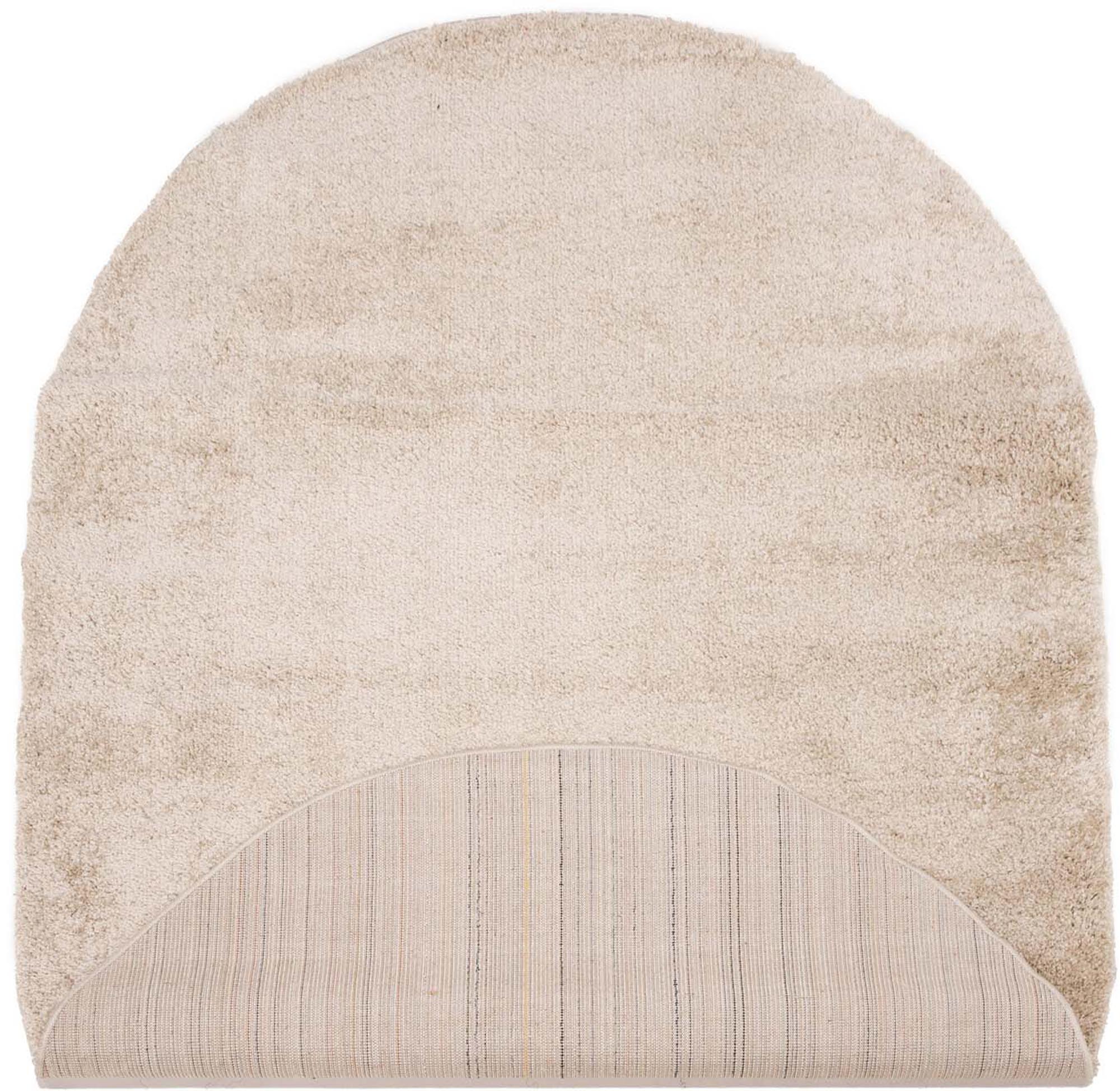 Walter Pluto Teppich Oval in Beige präsentiert im Onlineshop von KAQTU Design AG. Teppich ist von Venture Home