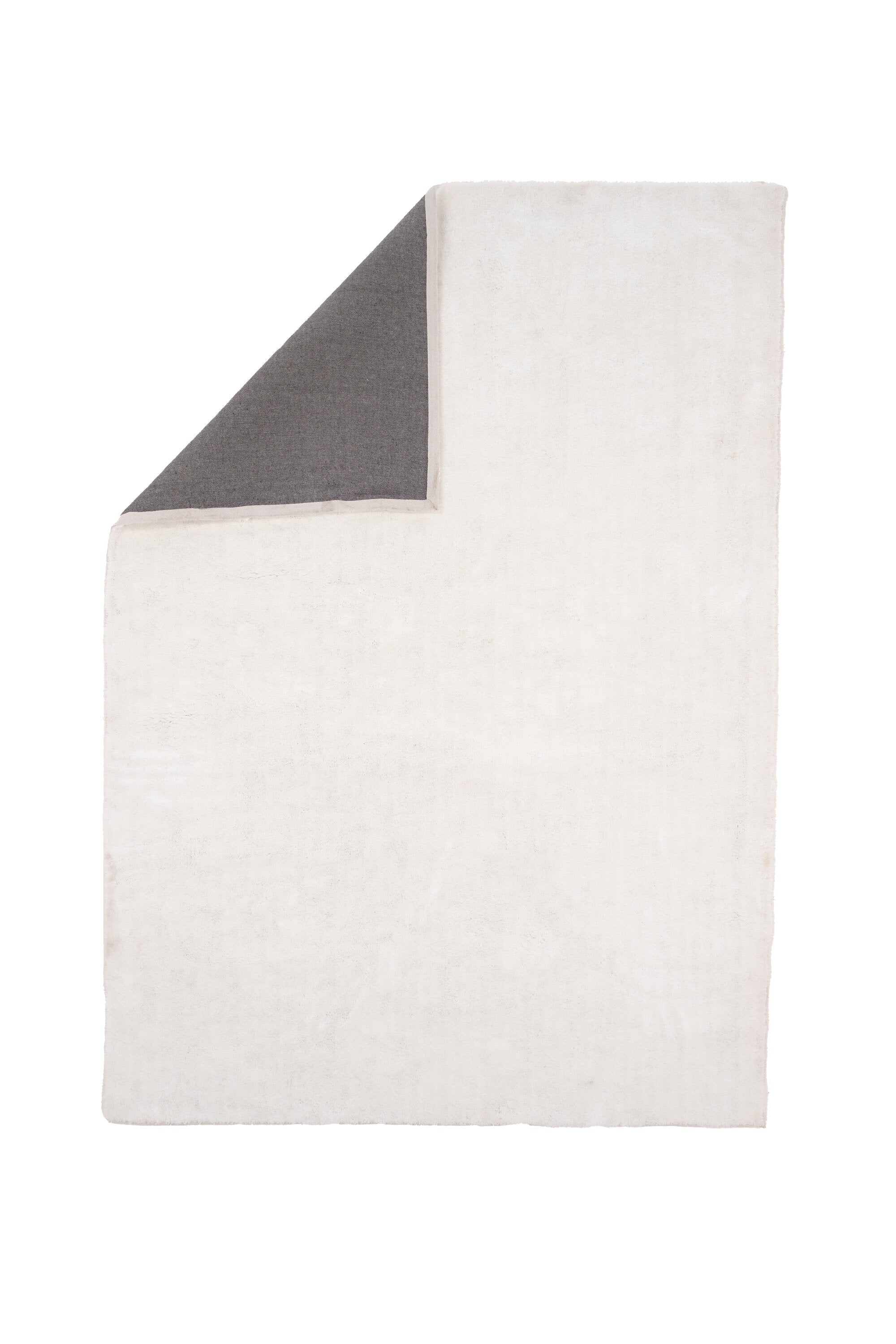Wunderteppich in Weiss präsentiert im Onlineshop von KAQTU Design AG. Teppich ist von Venture Home