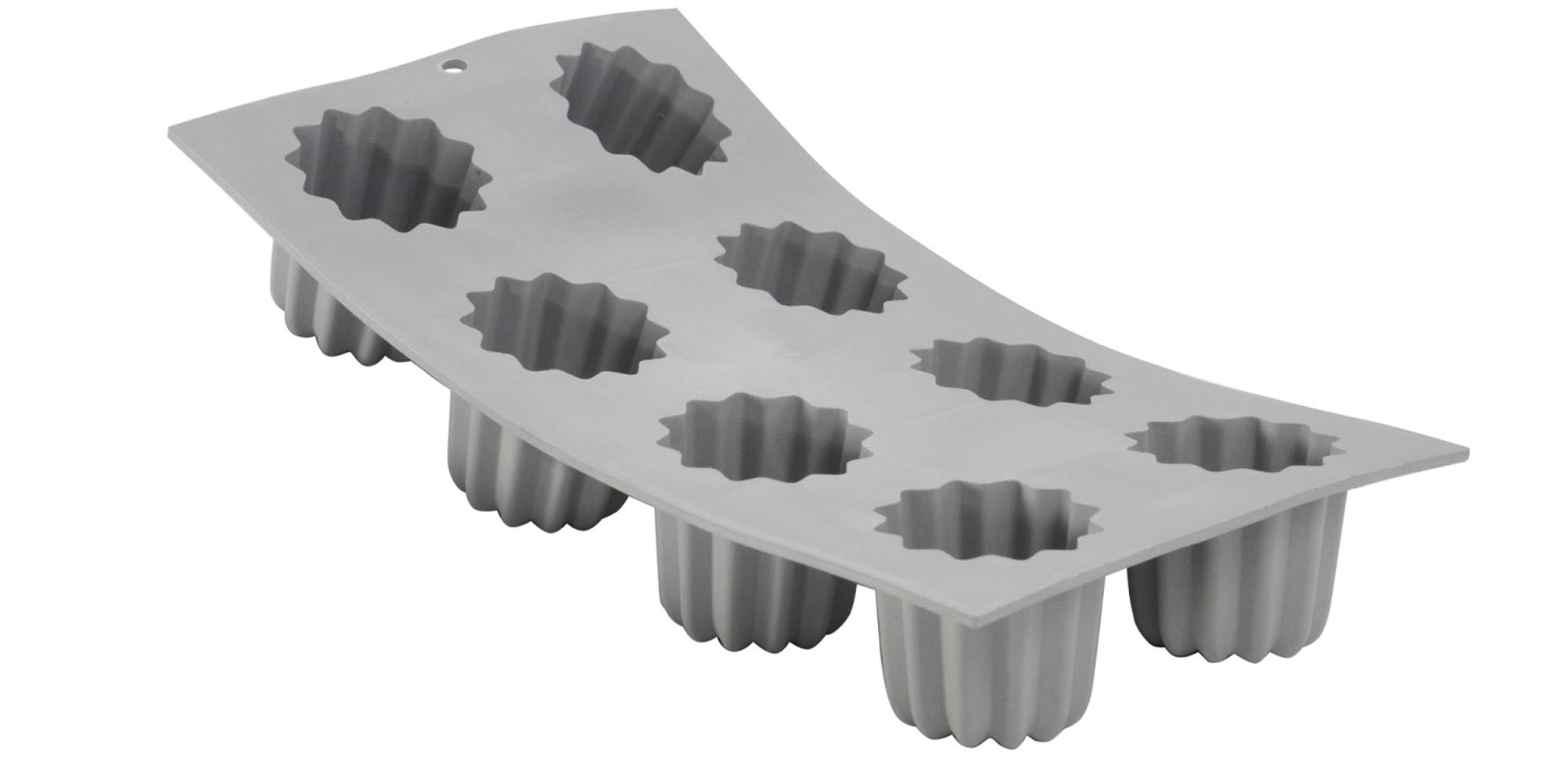 Entdecken Sie die de Buyer Elastomoule Backform 30x20 cm für 8 Cannelés. Hochwertiger Silikonschaum, hitzebeständig, leicht zu reinigen und ideal für Backliebhaber!