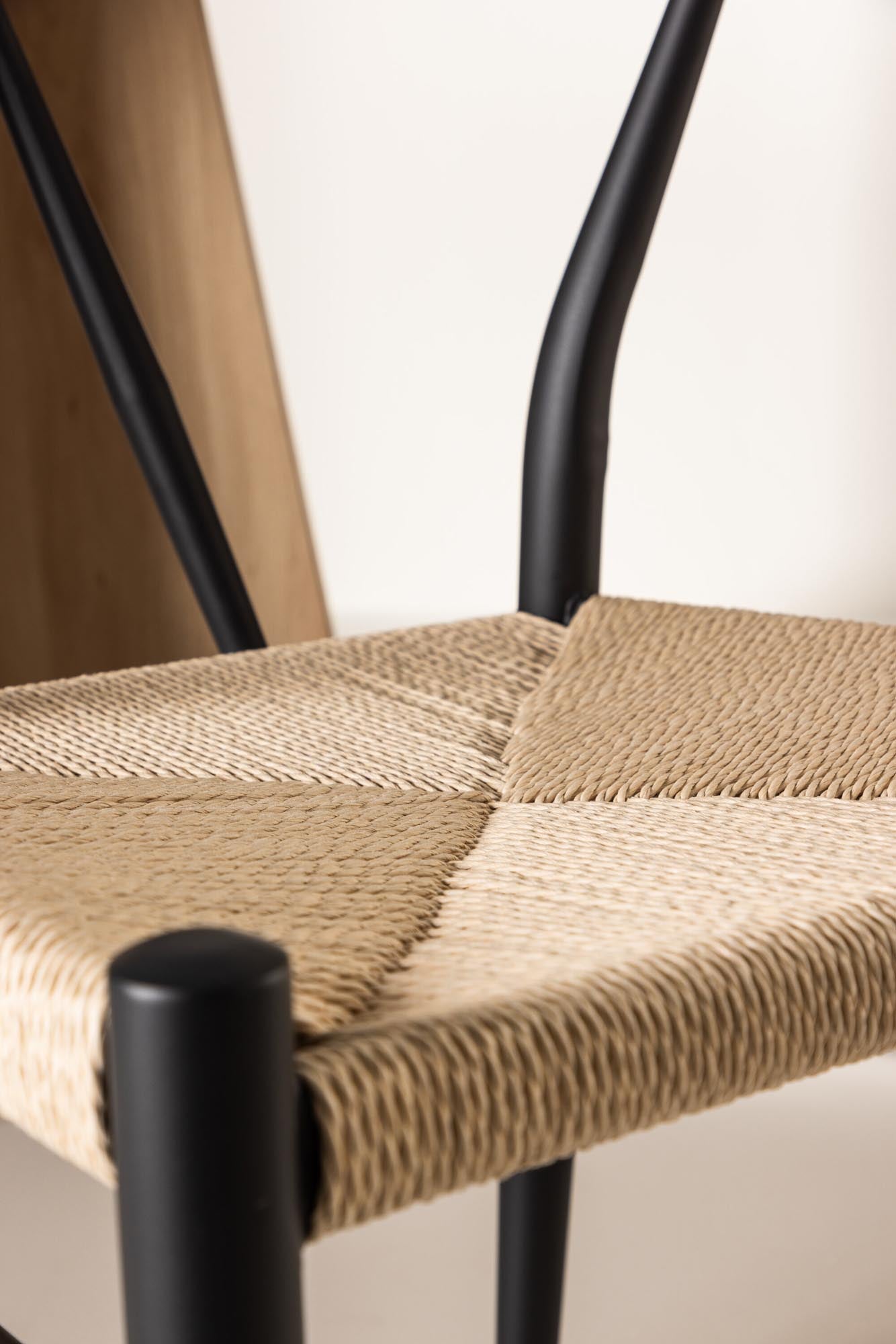 Alfons Stuhl: Zeitloses Rattan-Design für stilvolle Esszimmer.