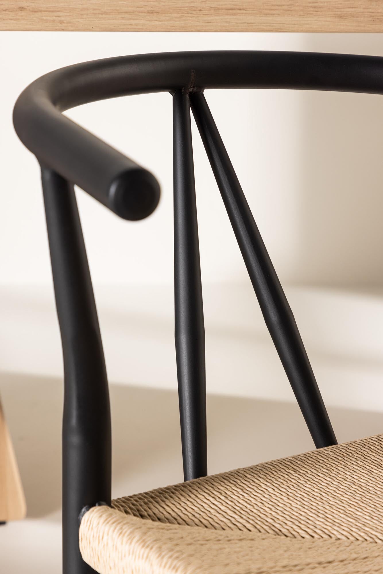 Alfons Esszimmerstuhl: Elegantes Rattan für moderne Wohnräume.