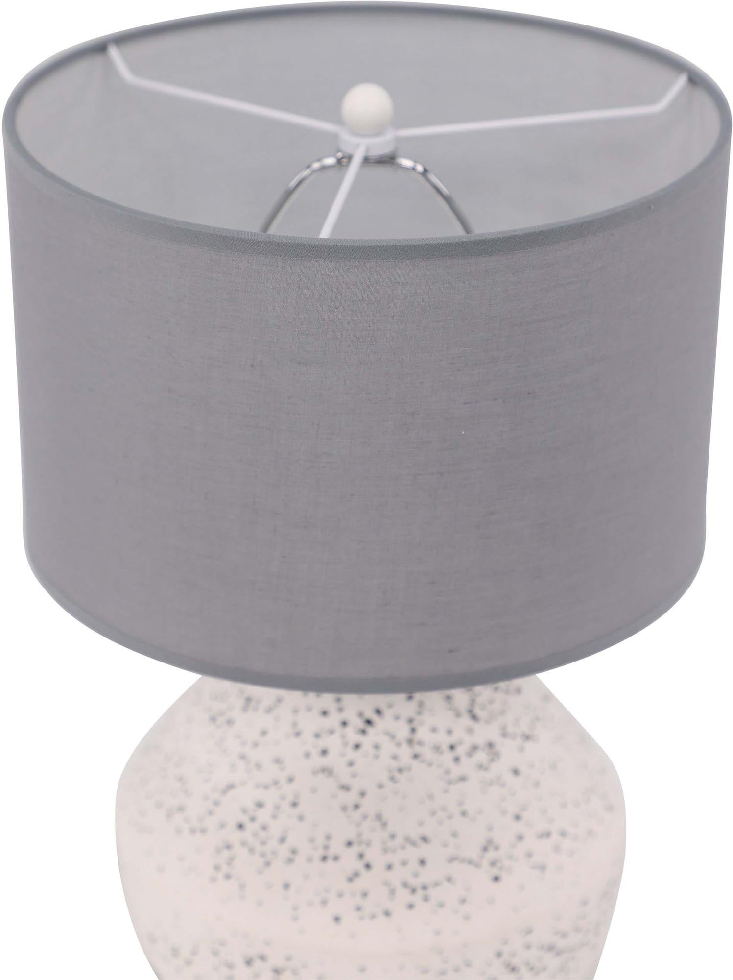 Entdecken Sie die Sisteron Tischleuchte von Venture Home – ein stilvolles Highlight aus Terrazzo und Leinen, ideal für jedes Zuhause.