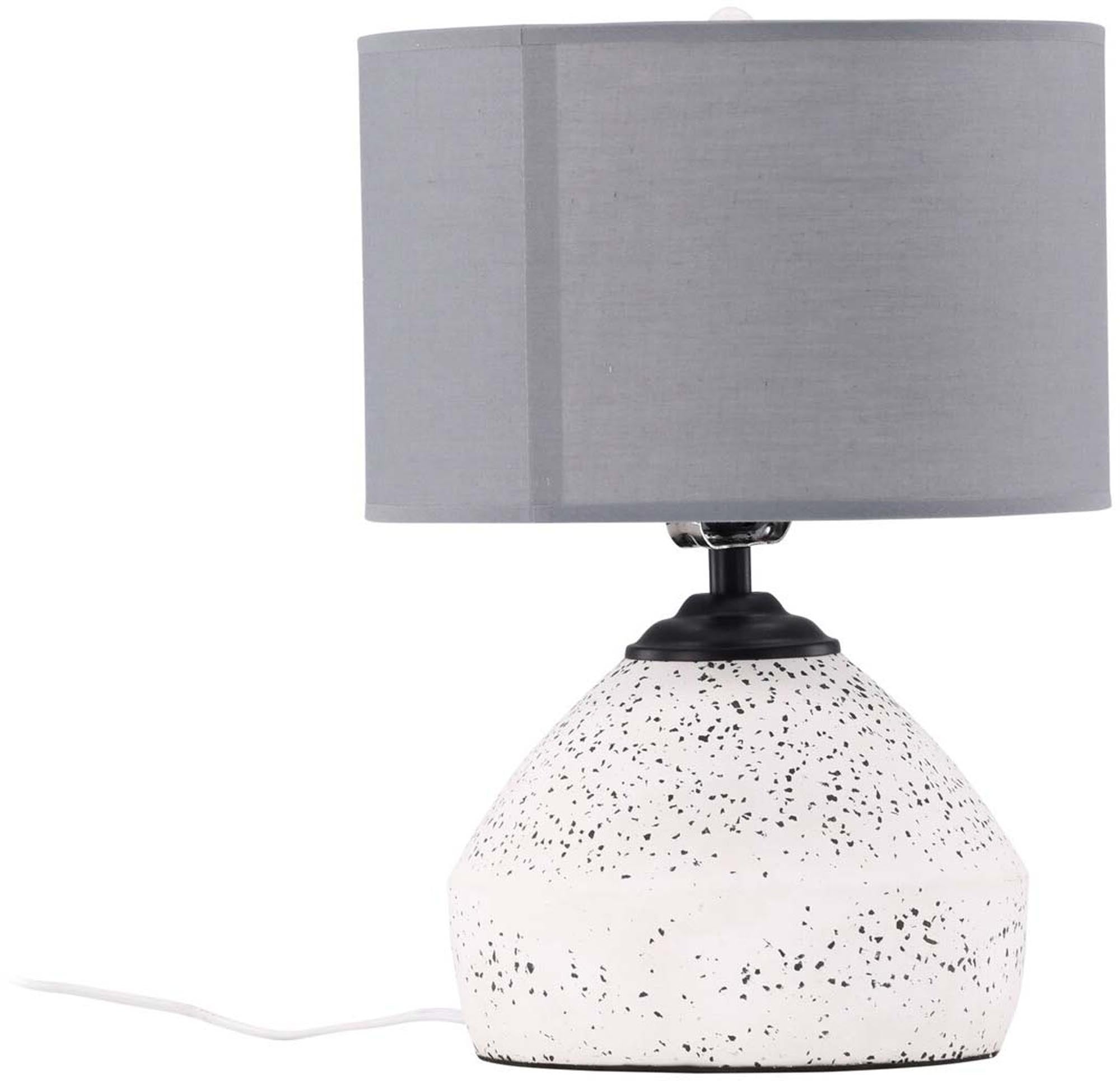 Die Sisteron Tischleuchte von Venture Home vereint Terrazzo-Fuss und Leinen-Schirm zu einem stilvollen, zeitlosen Design-Highlight.