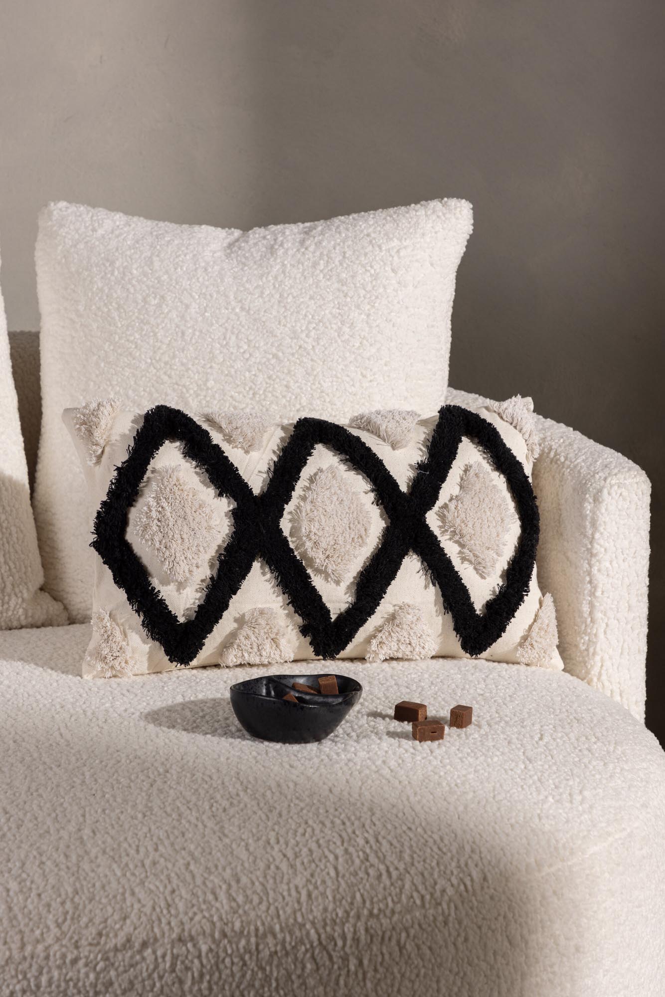 Eleganter Emelie Kissenbezug: Modernes Design in Schwarz-Weiss, aus Polyester und Baumwolle, pflegeleicht mit Reissverschluss.