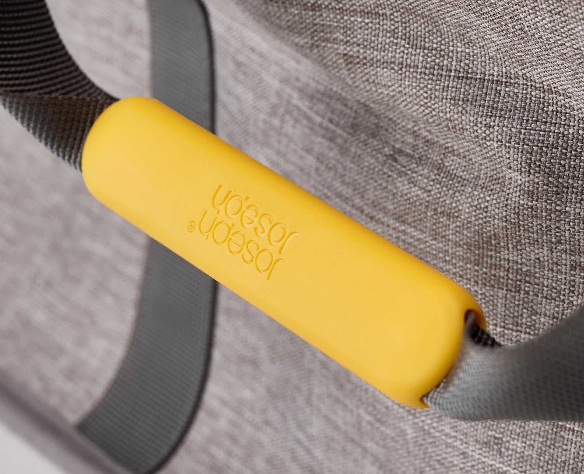 Praktischer, faltbarer Wäschekorb in elegantem Grau von Joseph Joseph.