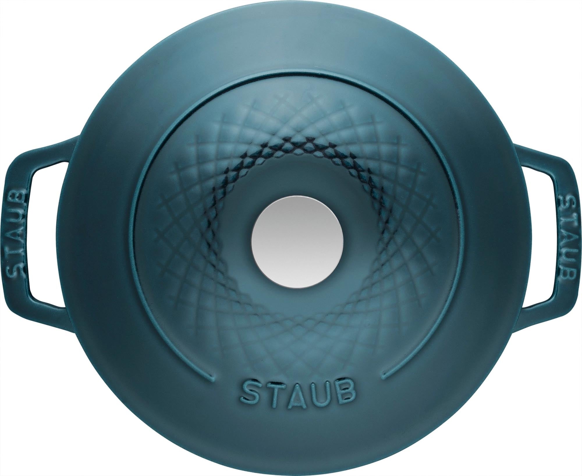 Entdecken Sie die vielseitige Twisted Cocotte 3.8l von Staub – perfektes Gusseisen für gleichmäßiges Garen und stilvolles Kochen.