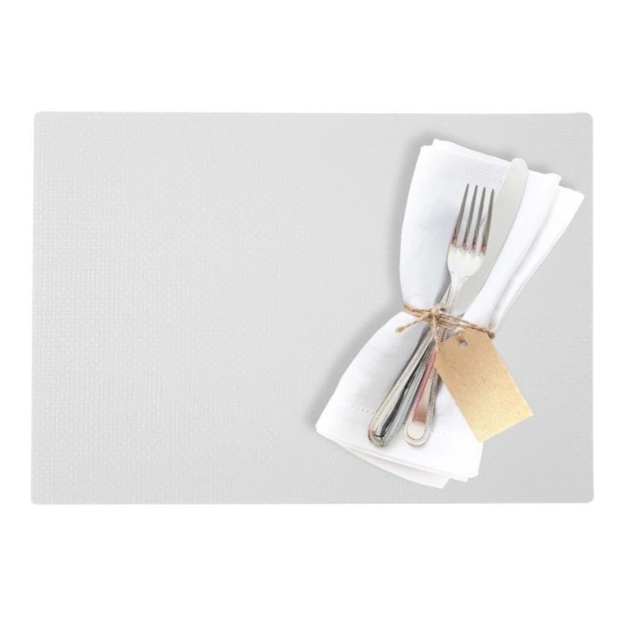 Elegantes, rechteckiges Tischset aus weissem Polypropylen, 45x32,5 cm, ideal für stilvolle Tischdekorationen von Westmark.