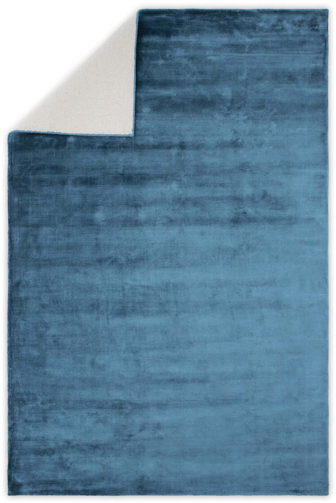 Entdecken Sie den Indra Teppich von Venture Home: Luxuriöse Viskose, elegantes Design und zahlreiche Farben für ein stilvolles Wohnambiente.