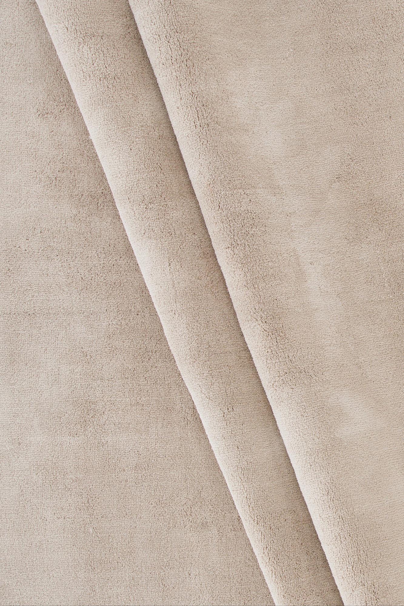 Wunderteppich in Beige präsentiert im Onlineshop von KAQTU Design AG. Teppich ist von Venture Home